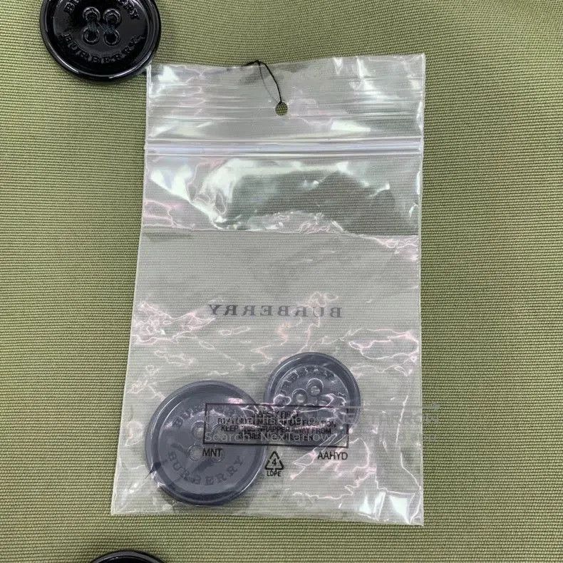 Burberry Green Trench Coat with Belt.