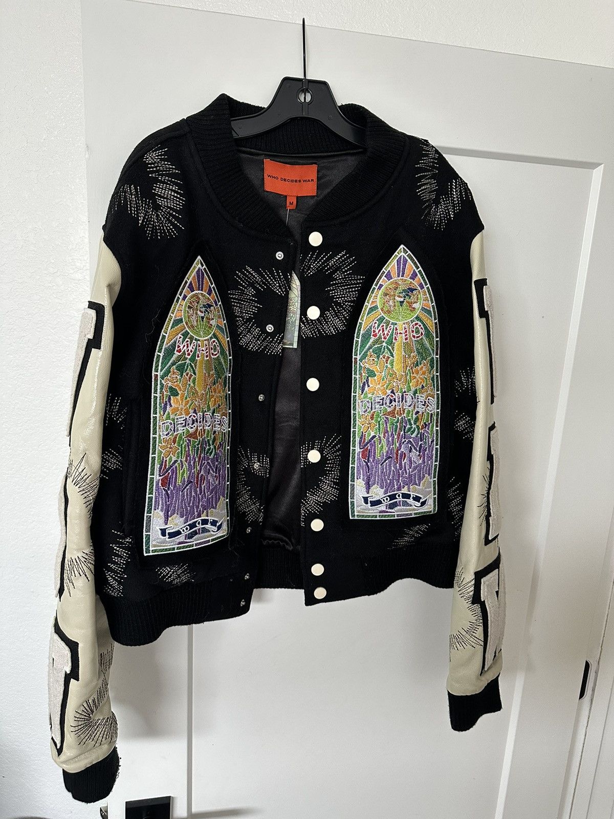 image of Who Decides War Varsity Jacket in Black, Men's (Size Medium)