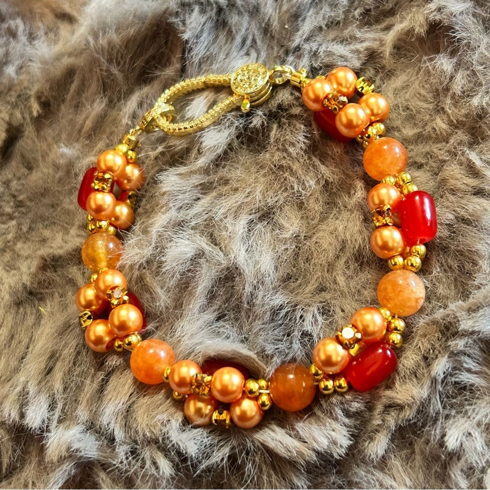 Handmade Handcrafted elegant glam mango twist orange jade bracelet Size ONE SIZE - 8 Thumbnail