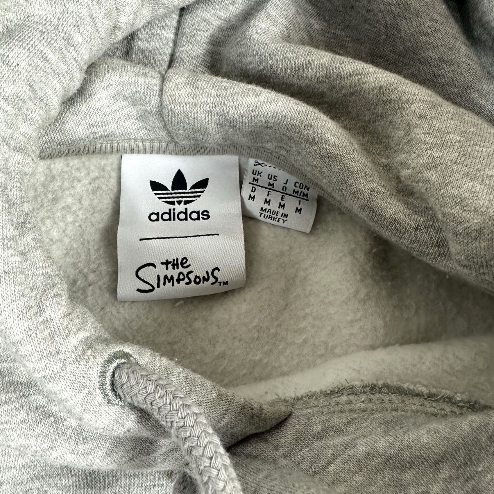 Adidas Adidas Simpsons DOH Hoodie Sweater Heather Gray HA5816 Men’s Medium Standard Fit Hooded, Graphic Print, Pockets, Drawstring, Athletic Shirt Size US M / EU 48-50 / 2 - 5 Thumbnail