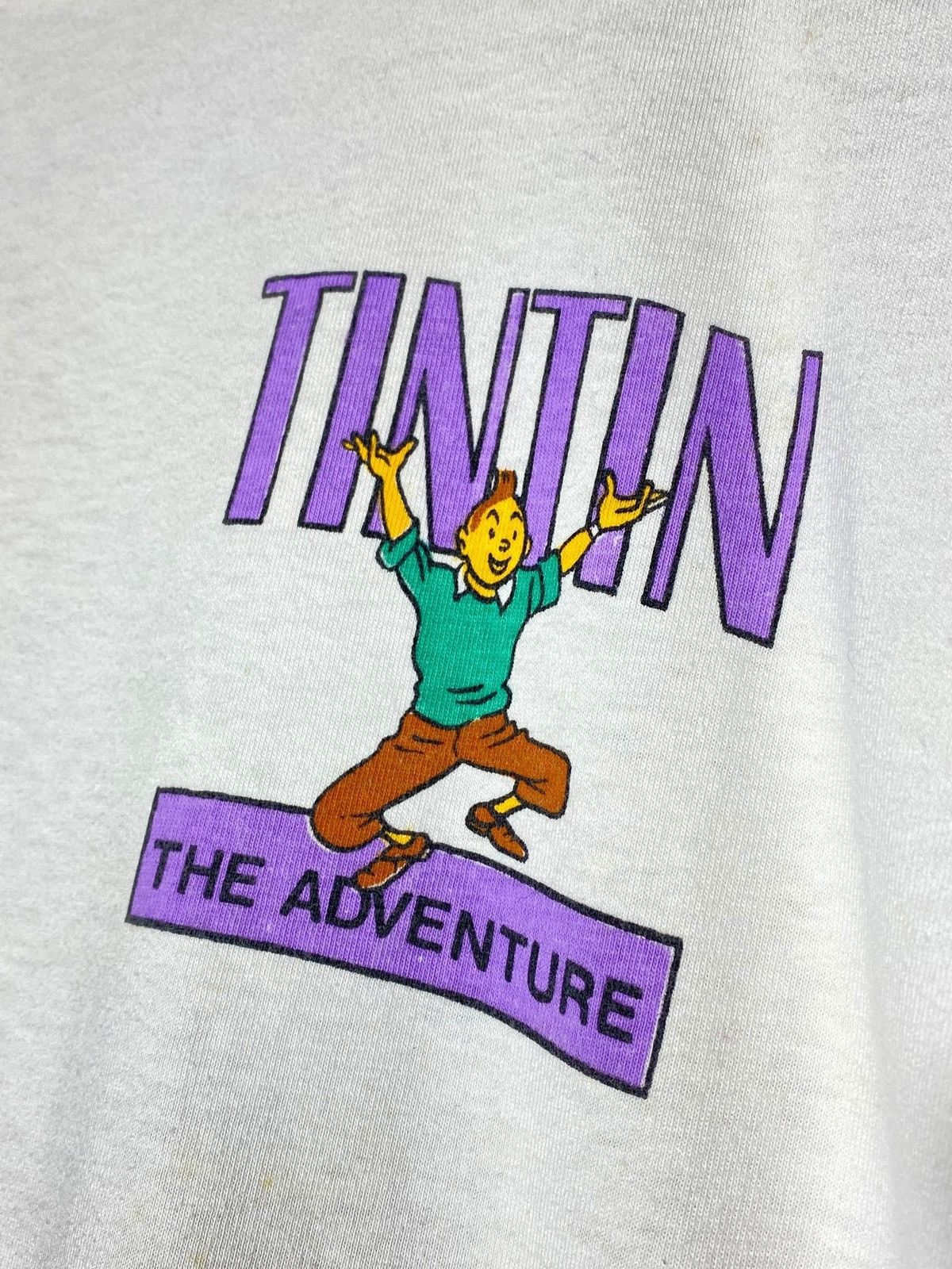 Vintage 🔥 90s TINTIN BLACK GOLD TEE JEEP EXPLOSION RARE GRAPHIC Size US L / EU 52-54 / 3 - 4 Thumbnail