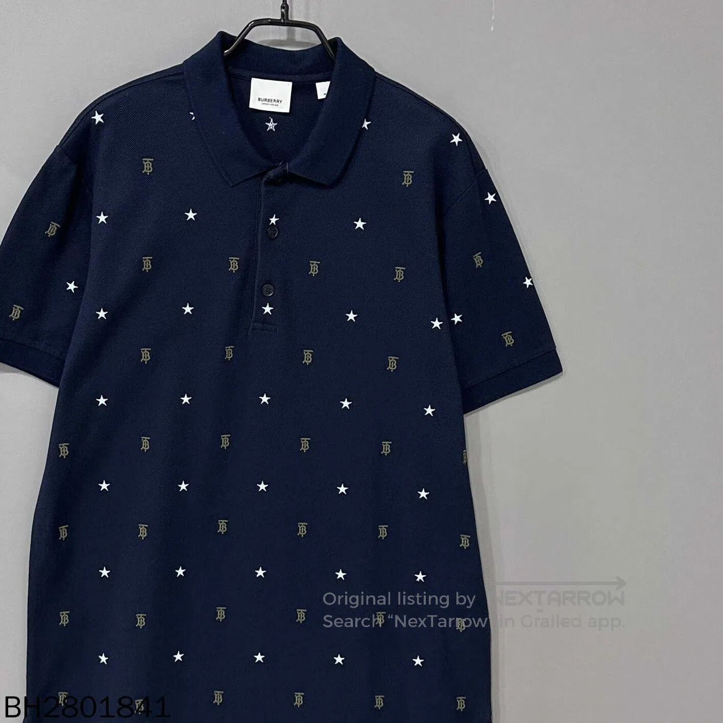 Burberry navy embroidered logo polo shirt by Burberry. Size US M / EU 48-50 / 2 - 3 Thumbnail