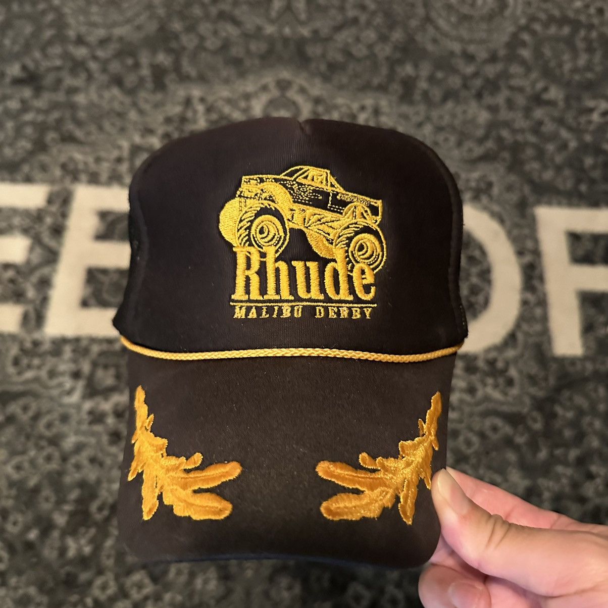image of Rhude Malibu Derby Trucker Hat in Black, Men's