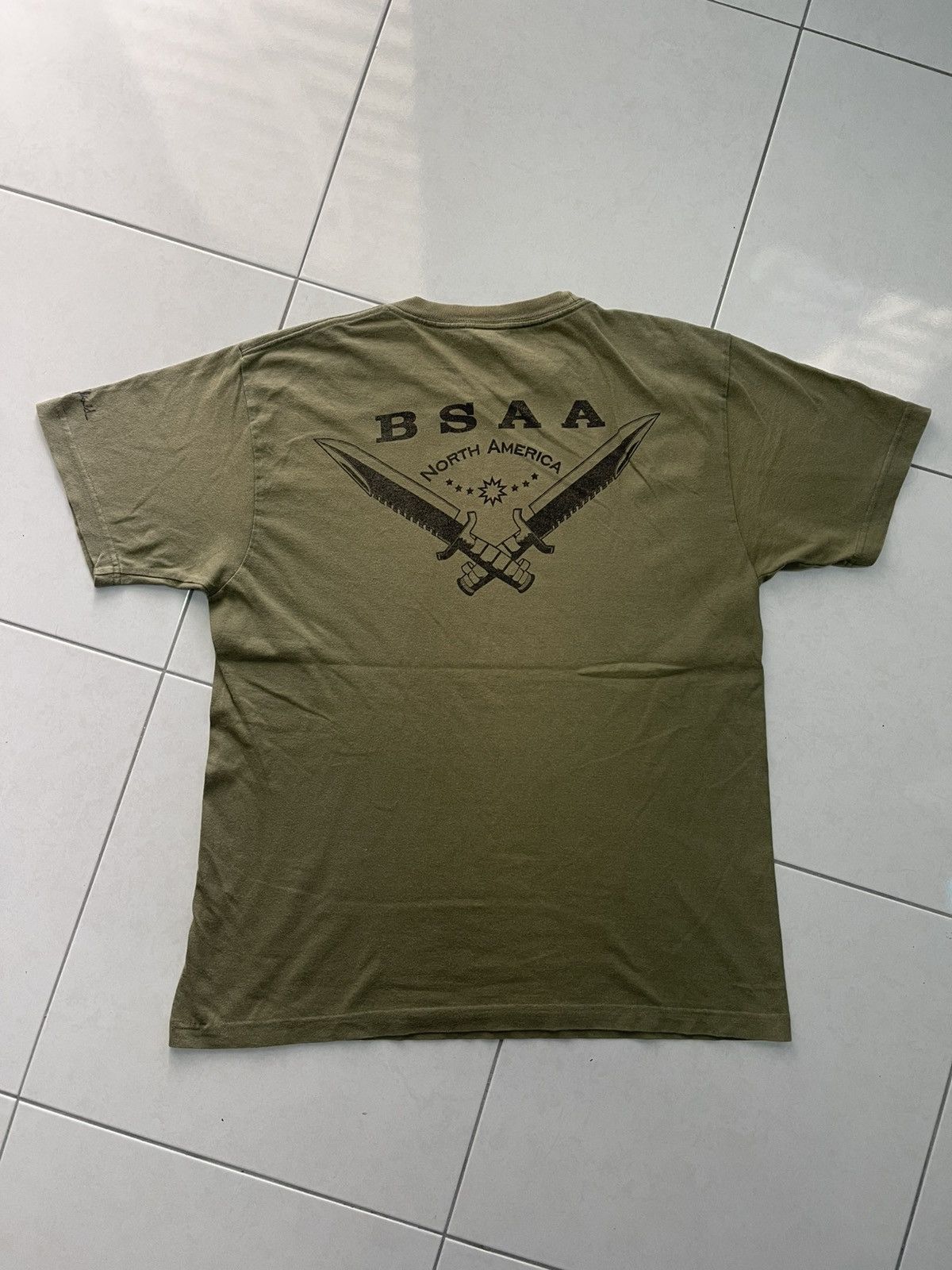 Vintage VINTAGE CAPCOM BSAA NORTH AMERICA BACK HIT VERY RARE Size US L / EU 52-54 / 3 - 1 Thumbnail