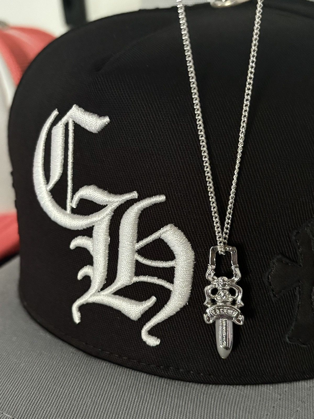 image of Chrome Hearts Rhodium Dagger Zipper Pendant in Silver, Men's