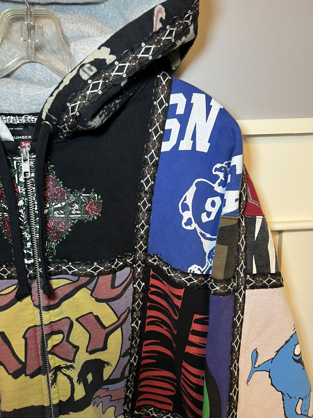 Number (N)ine × Supreme Supreme X Number (N)ine patchwork zip-up hoodie Size US XL / EU 56 / 4 - 8 Thumbnail