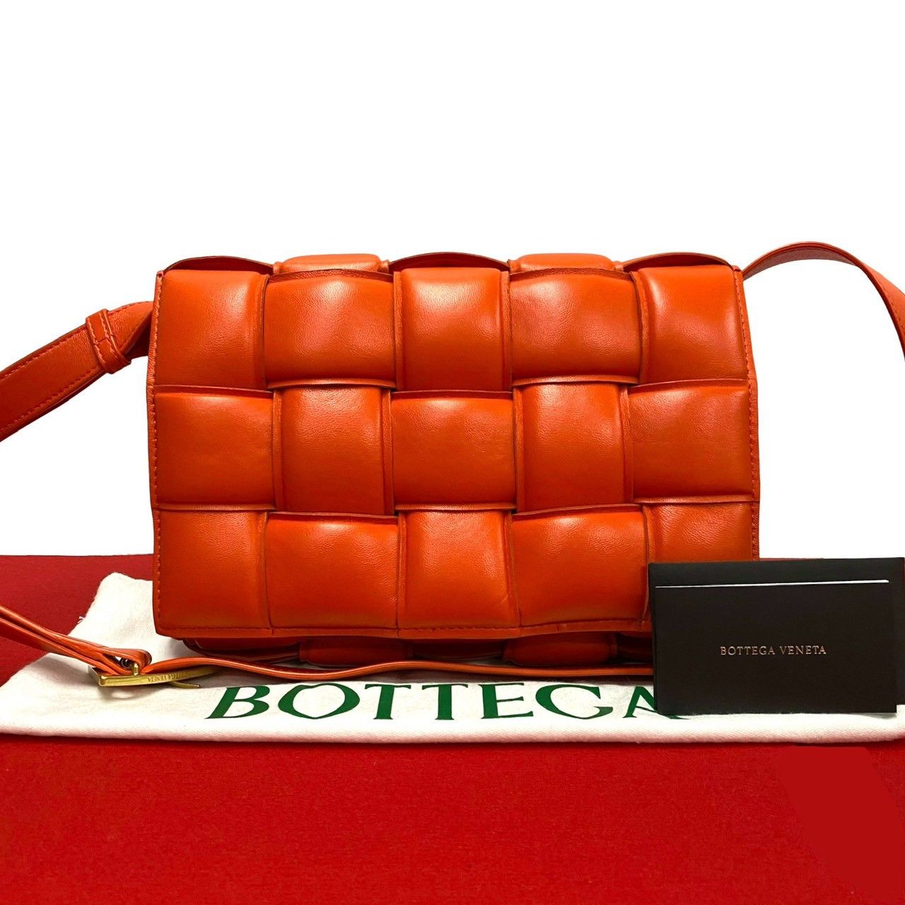 Bottega Veneta Bottega Veneta Padded Cassette Leather Shoulder Bag Leather Shoulder Bag 23693 in Orange, Women's