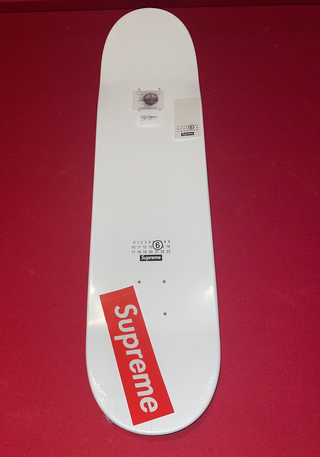 image of Mm6 Maison Margiela - Skateboard in White, Men's