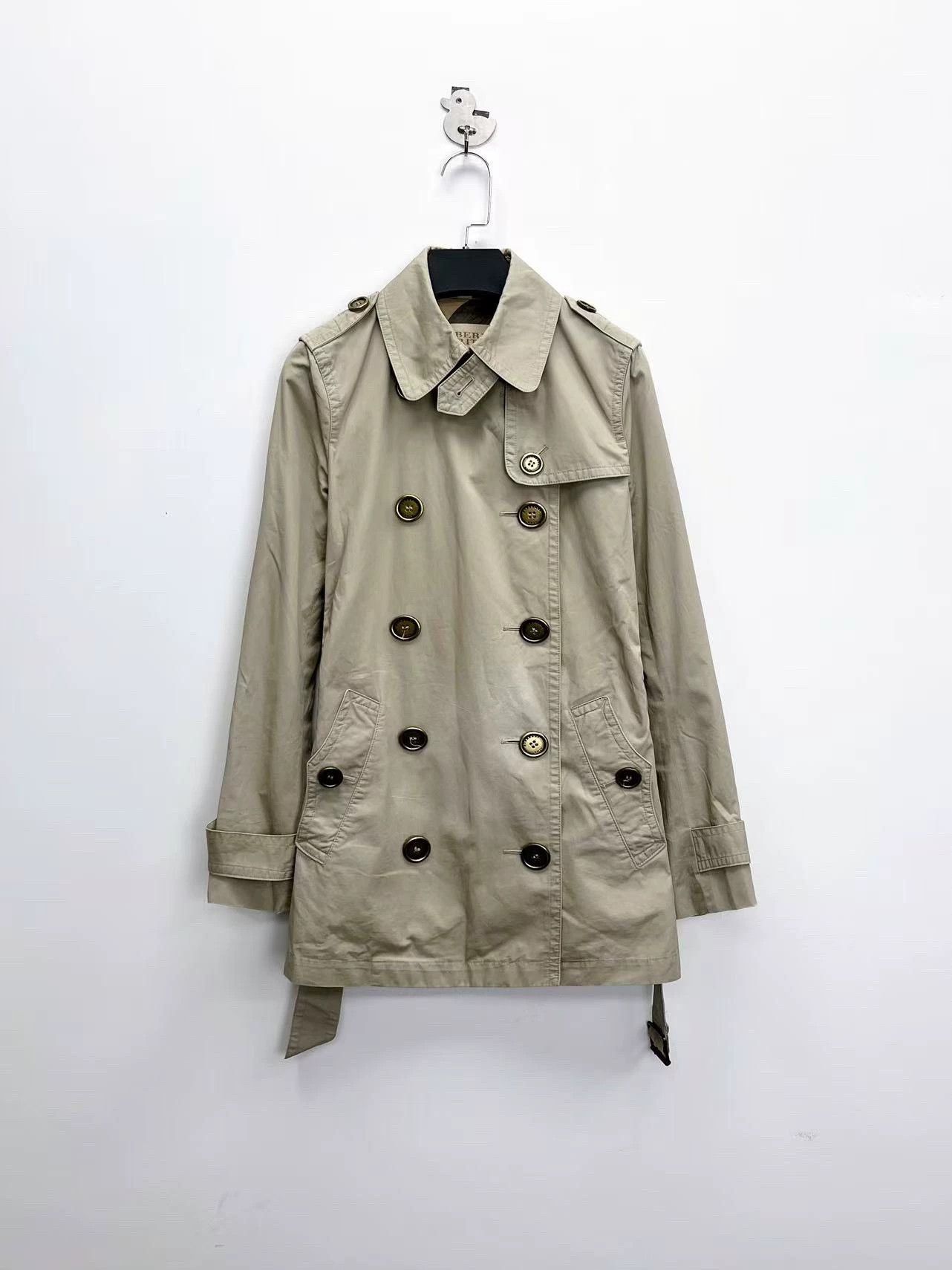 beige double-breasted trench coat by Burberry