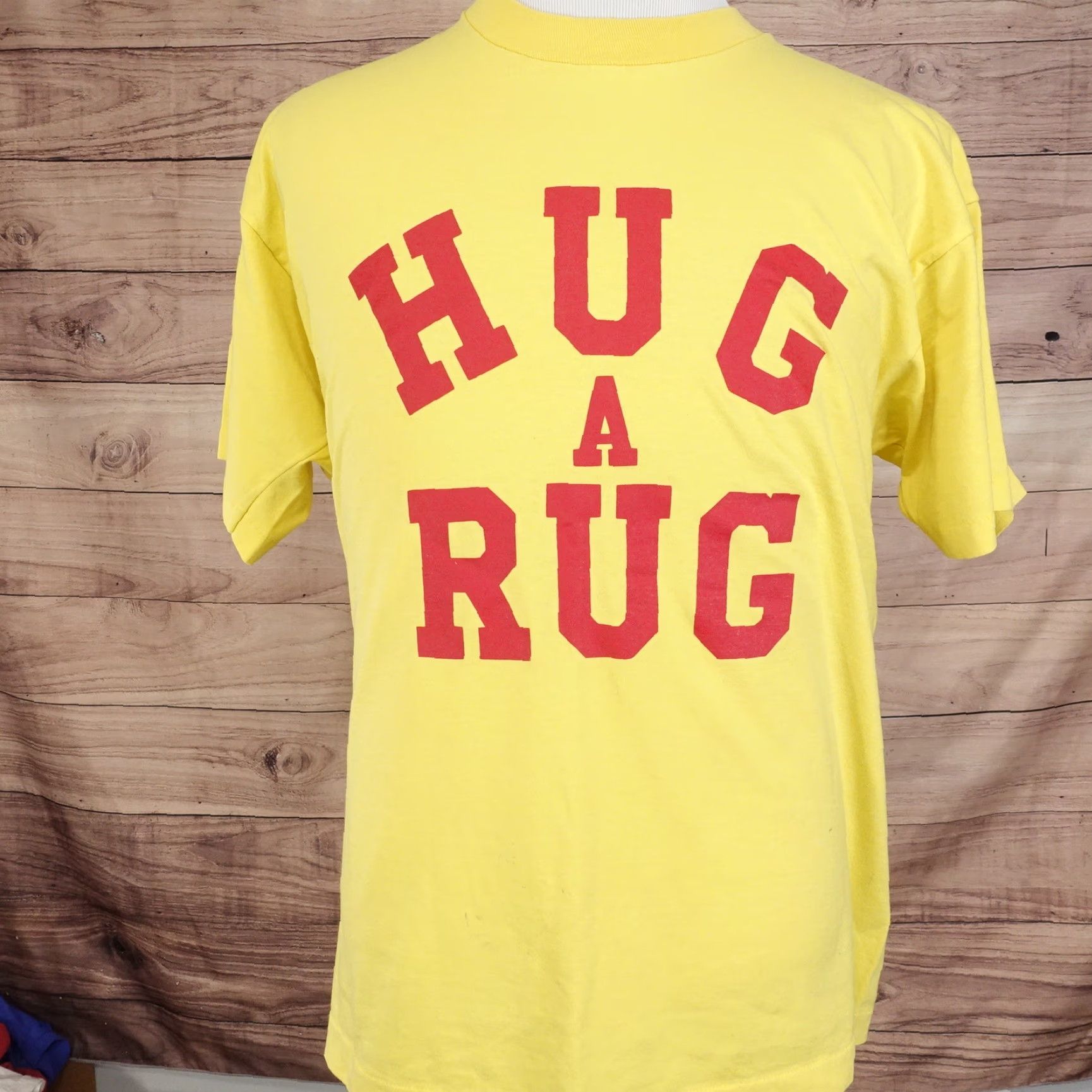 Fruit Of The Loom VINTAGE Fruit of the Loom Yellow T-Shirt XL Unisex Short Sleeve Hug A Rug Carpet Discount St Charles MO USA Mens Size US XL / EU 56 / 4 - 2 Thumbnail