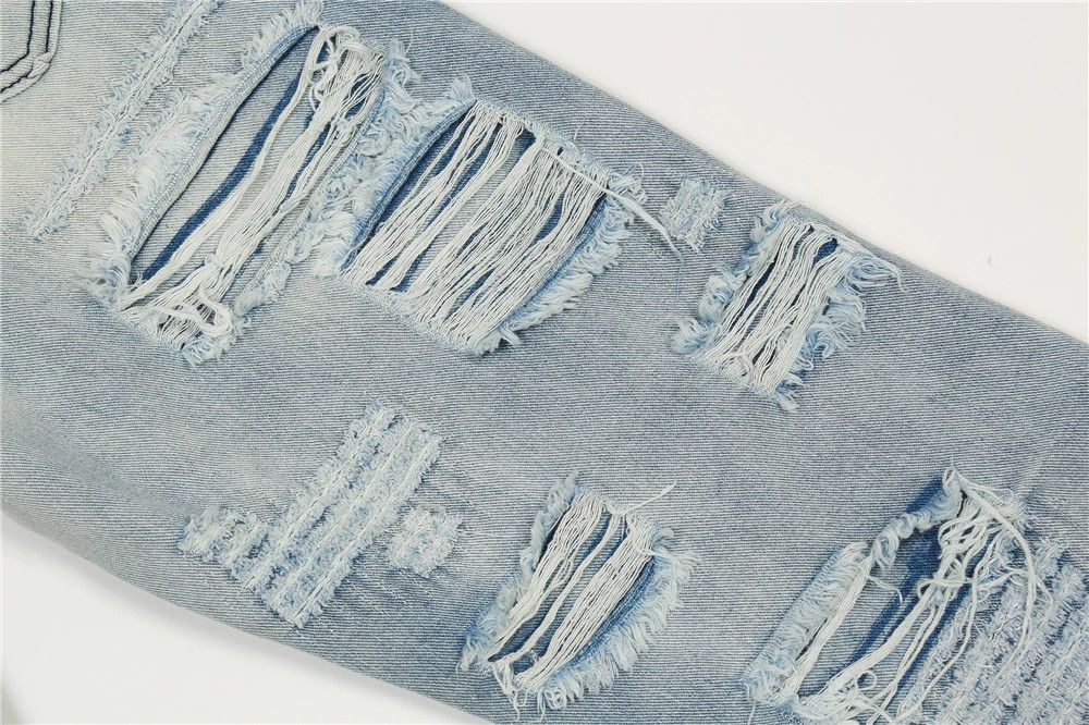grunge damaged ripped washed flared jeans