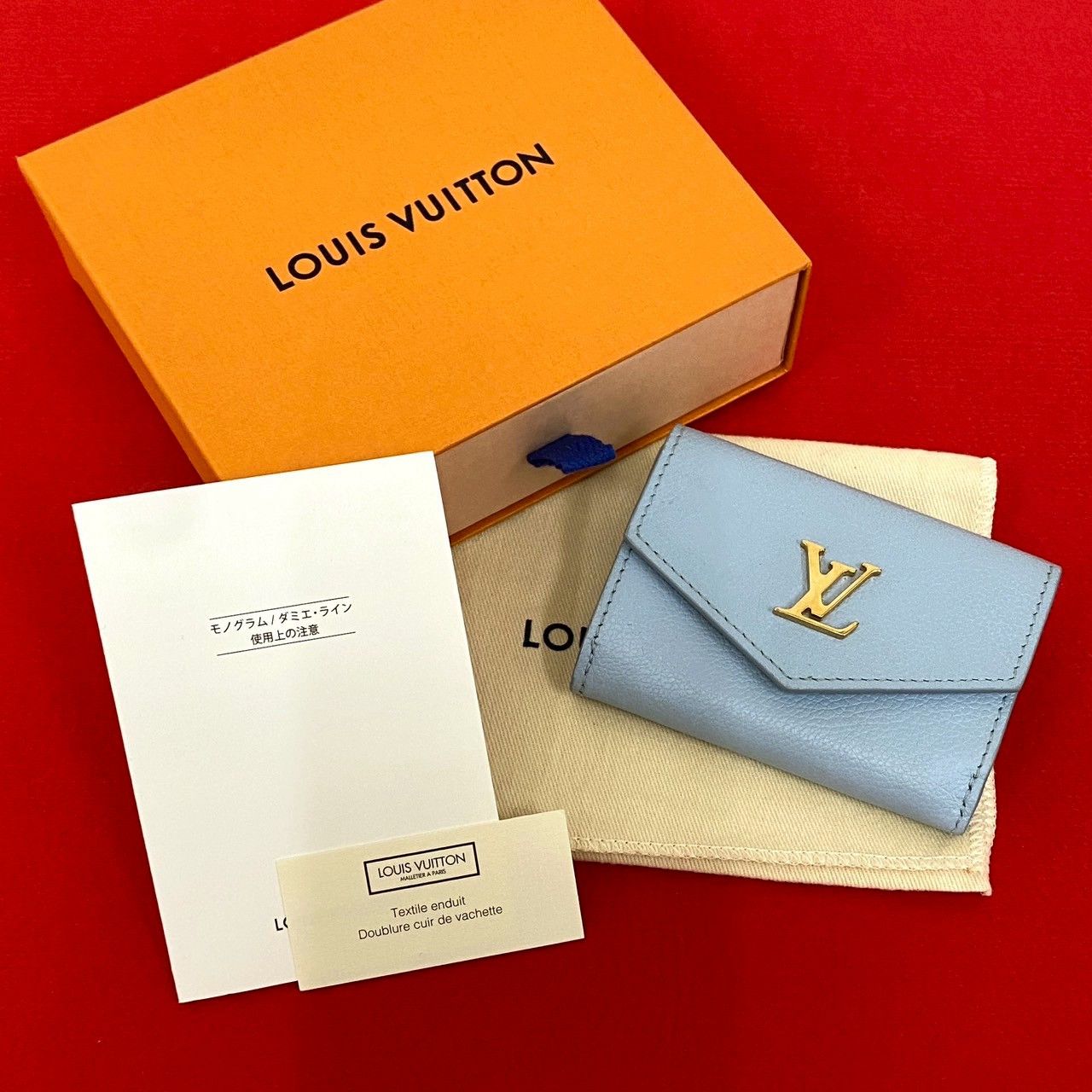 Louis Vuitton Louis Vuitton Louis Vuitton Portefeuille Lock Mini Leather Trifold Wallet Leather Short Wallet DUTY FREE for USA Size ONE SIZE - 1 Thumbnail