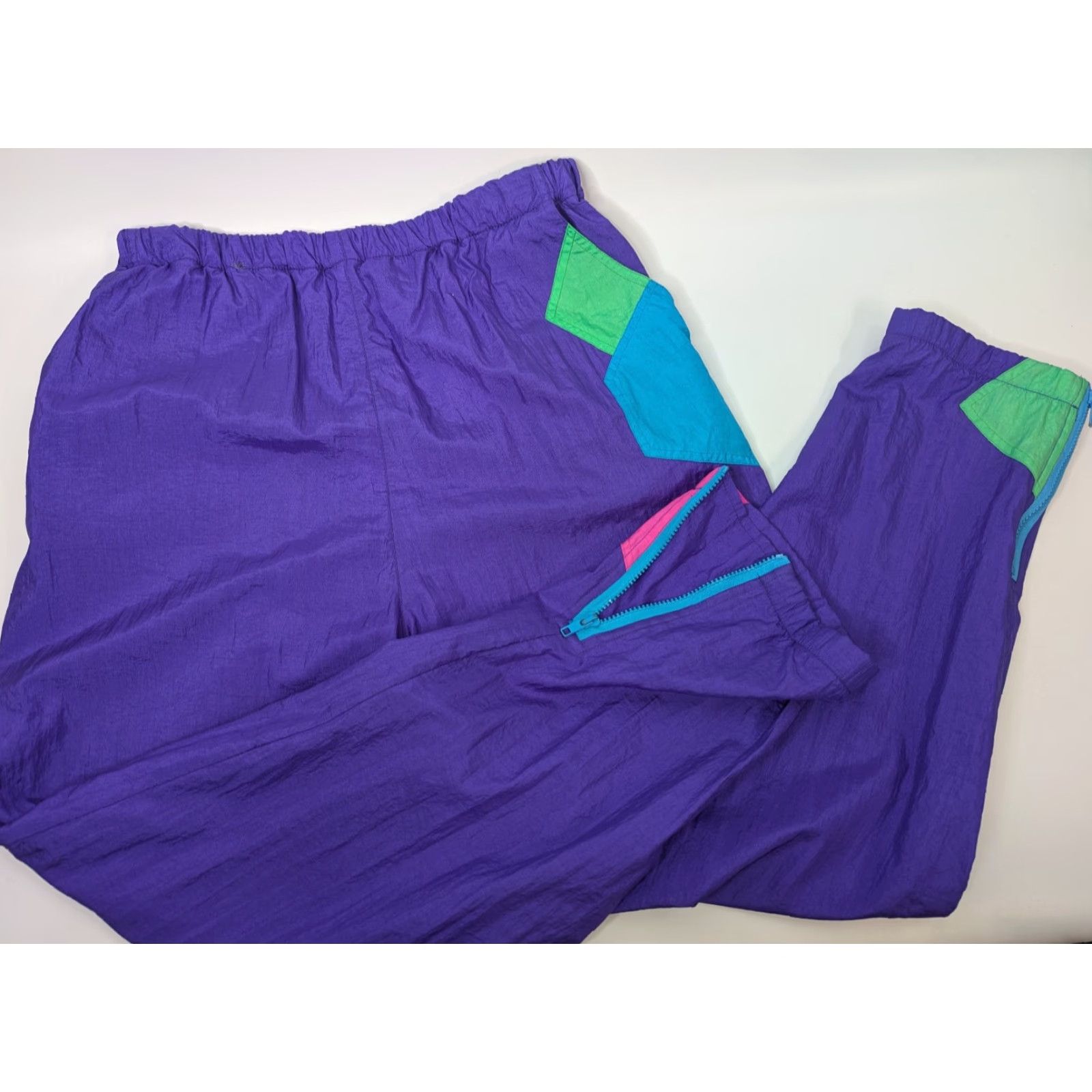 Vintage VINTAGE East West Purple Nylon Track Pants 18/20 Women Nylon Windbreaker Set Pocket Elastic Waist Wrinkle Resistant Retro 90s Athleisure Size 40" / US 18 - 2 Thumbnail