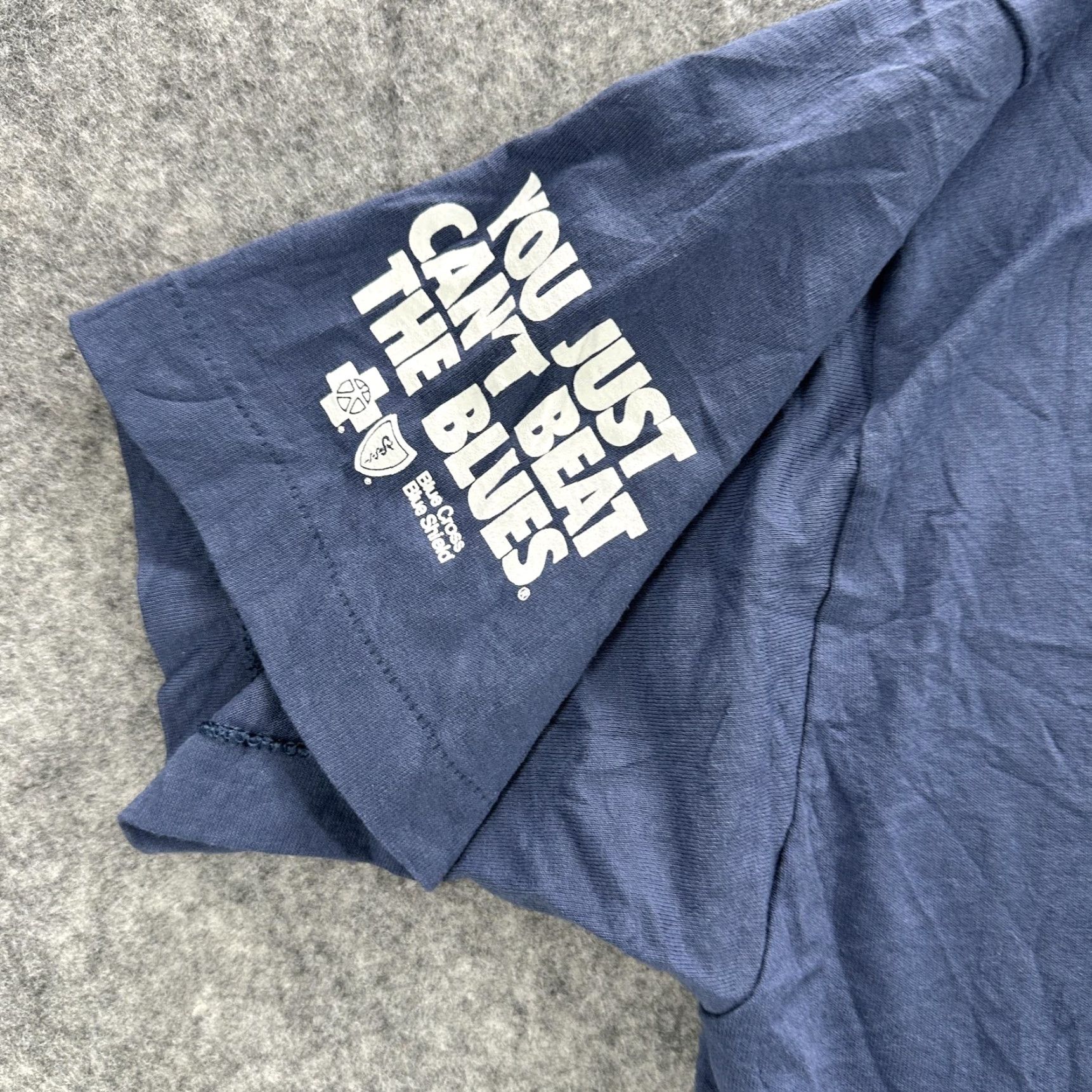 Fruit Of The Loom VINTAGE Blue Cross Blue Shield Shirt Mens Large Blue Golden Circle Games Tee 90s Size US L / EU 52-54 / 3 - 6 Thumbnail