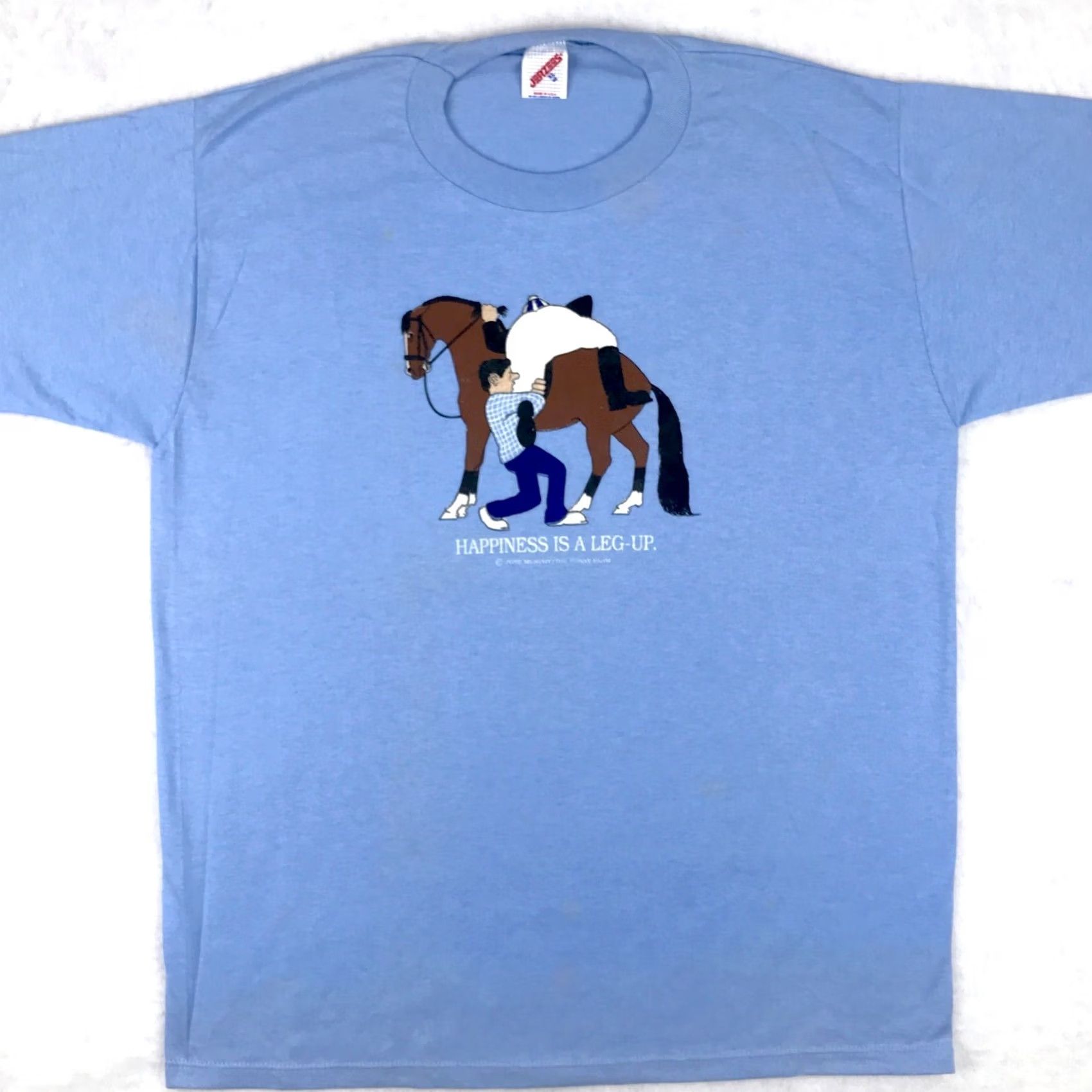 Jerzees NOS vtg 80s HAPPINESS IS A LEG UP HORSE JOCKEY CARTOON T-Shirt L blue Nike Shirt Ladies Mens Womens Boys Girls Size US L / EU 52-54 / 3 - 3 Thumbnail