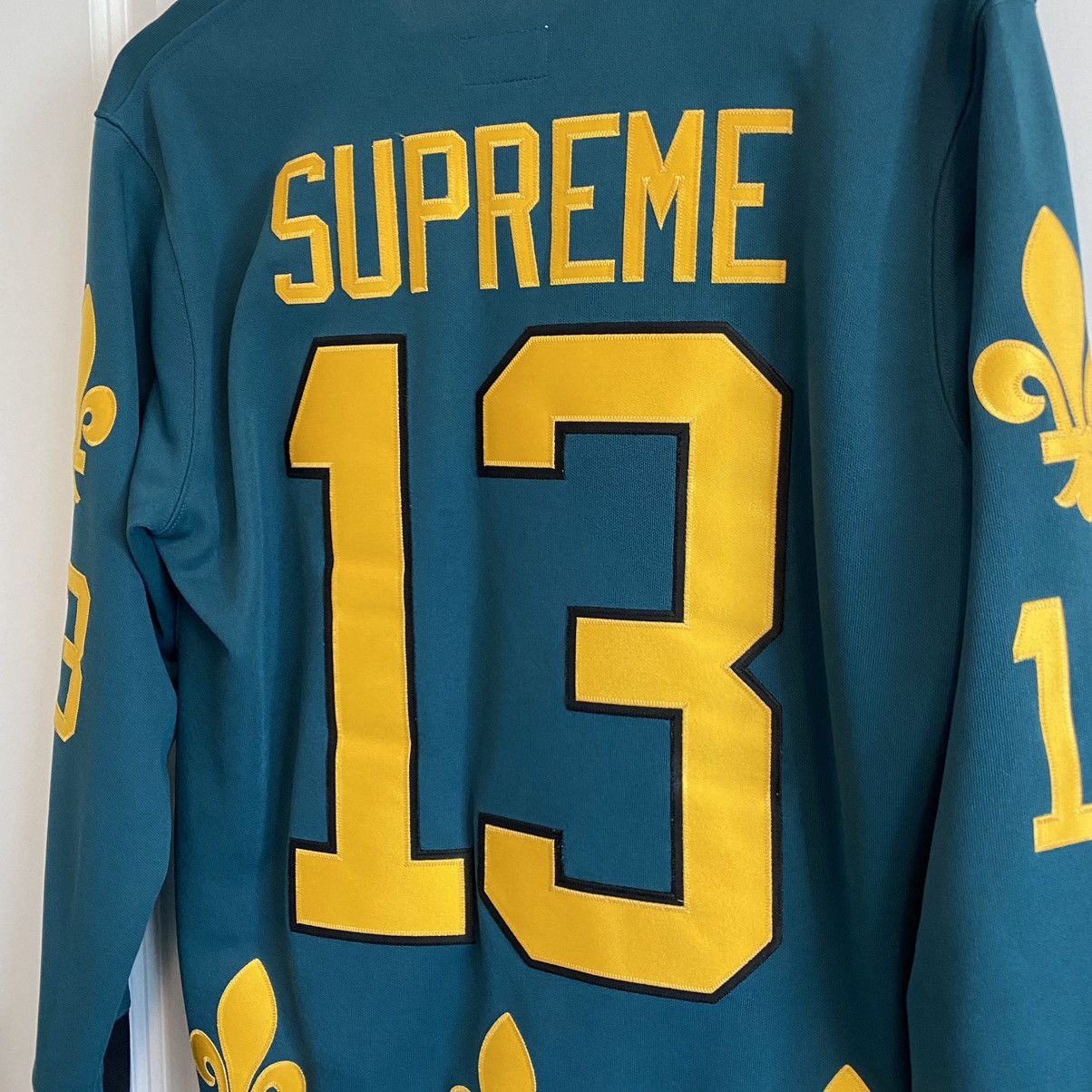 Supreme Fleur de Lis Hockey Top (Teal/Black/Yellow)