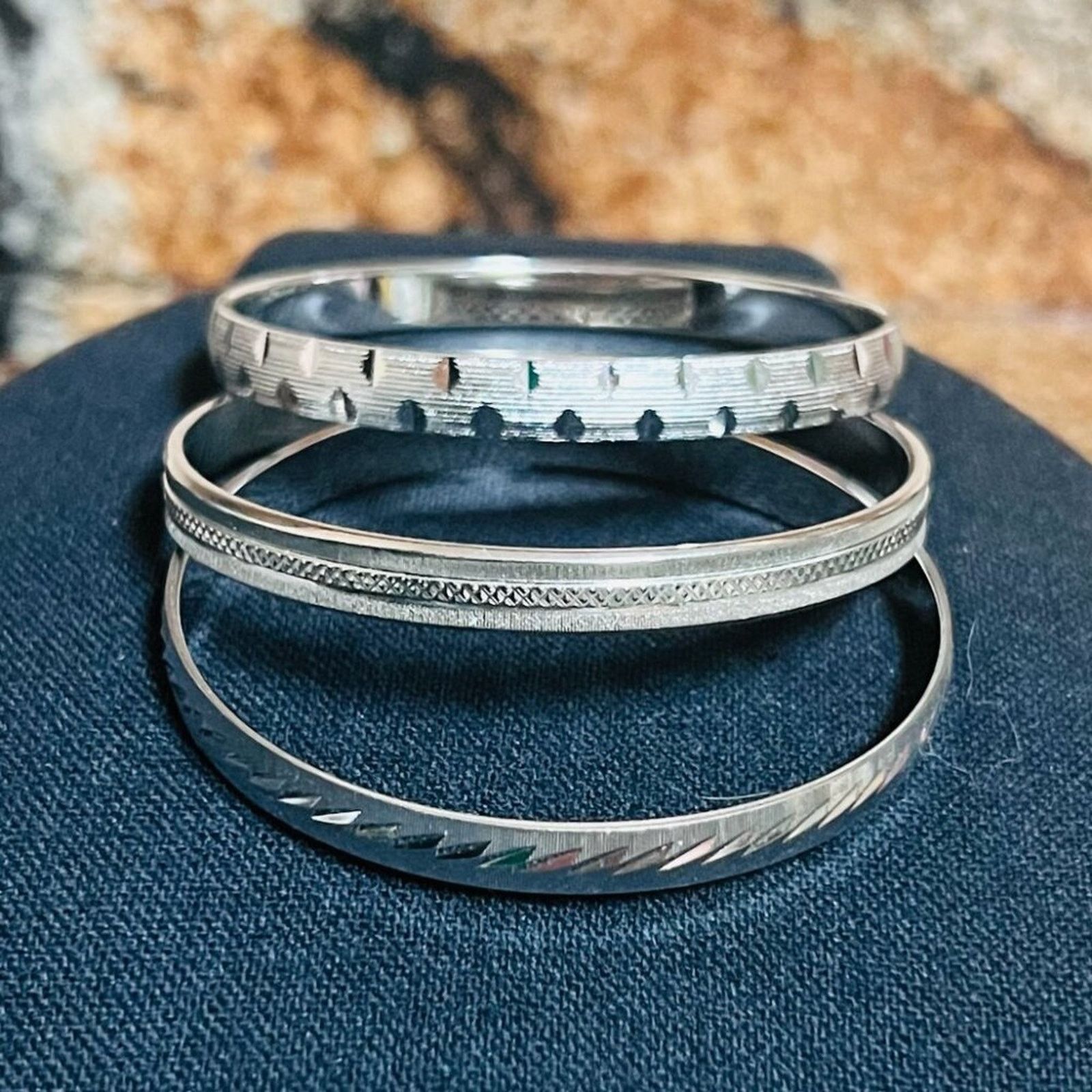 Monet Set of 3 Monet Bracelets, Silvertone, 7.5", closed metal Size ONE SIZE - 3 Thumbnail