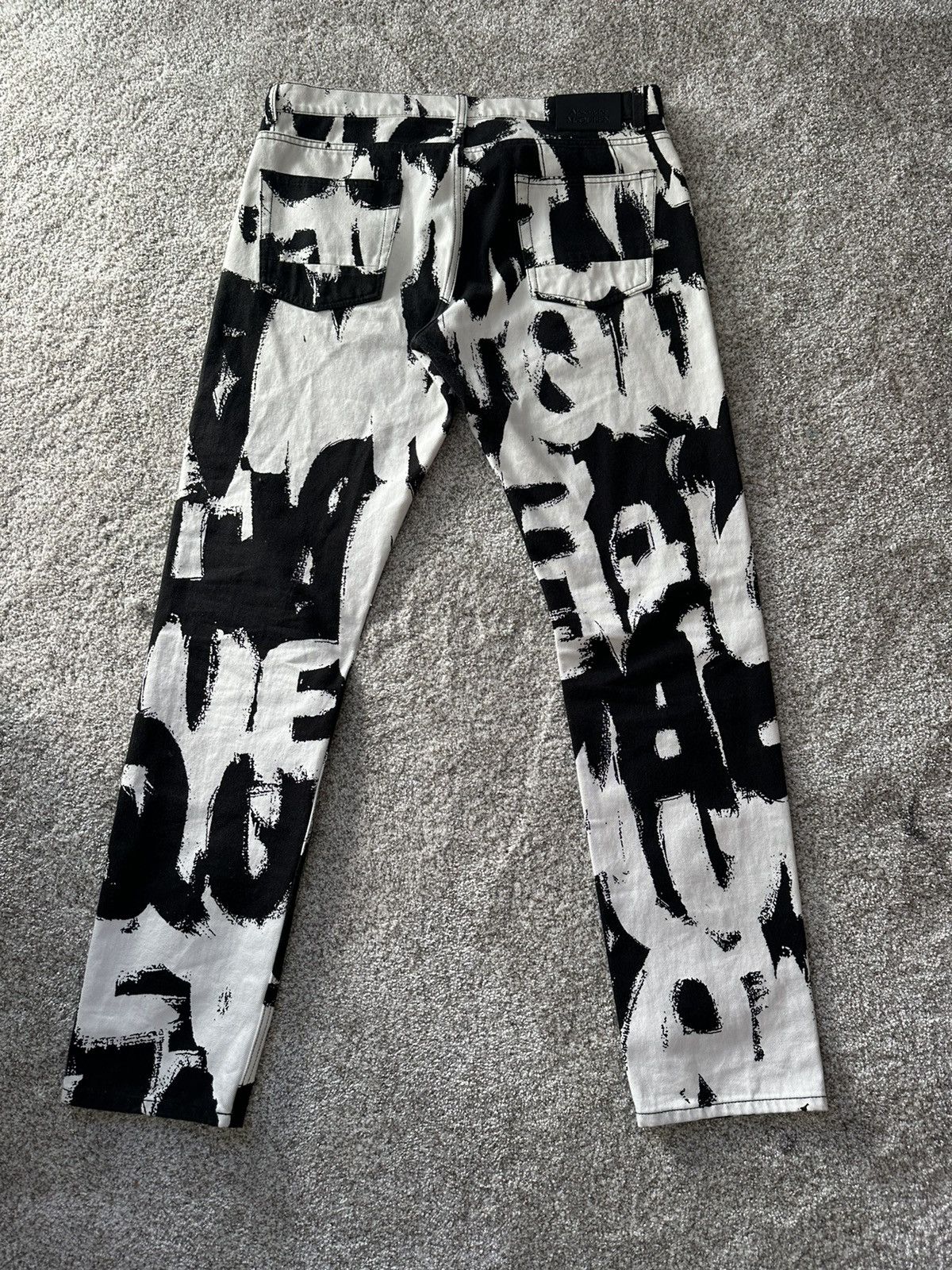 image of Alexander Mcqueen Graffiti Print Jeans in Black, Men's (Size 33)