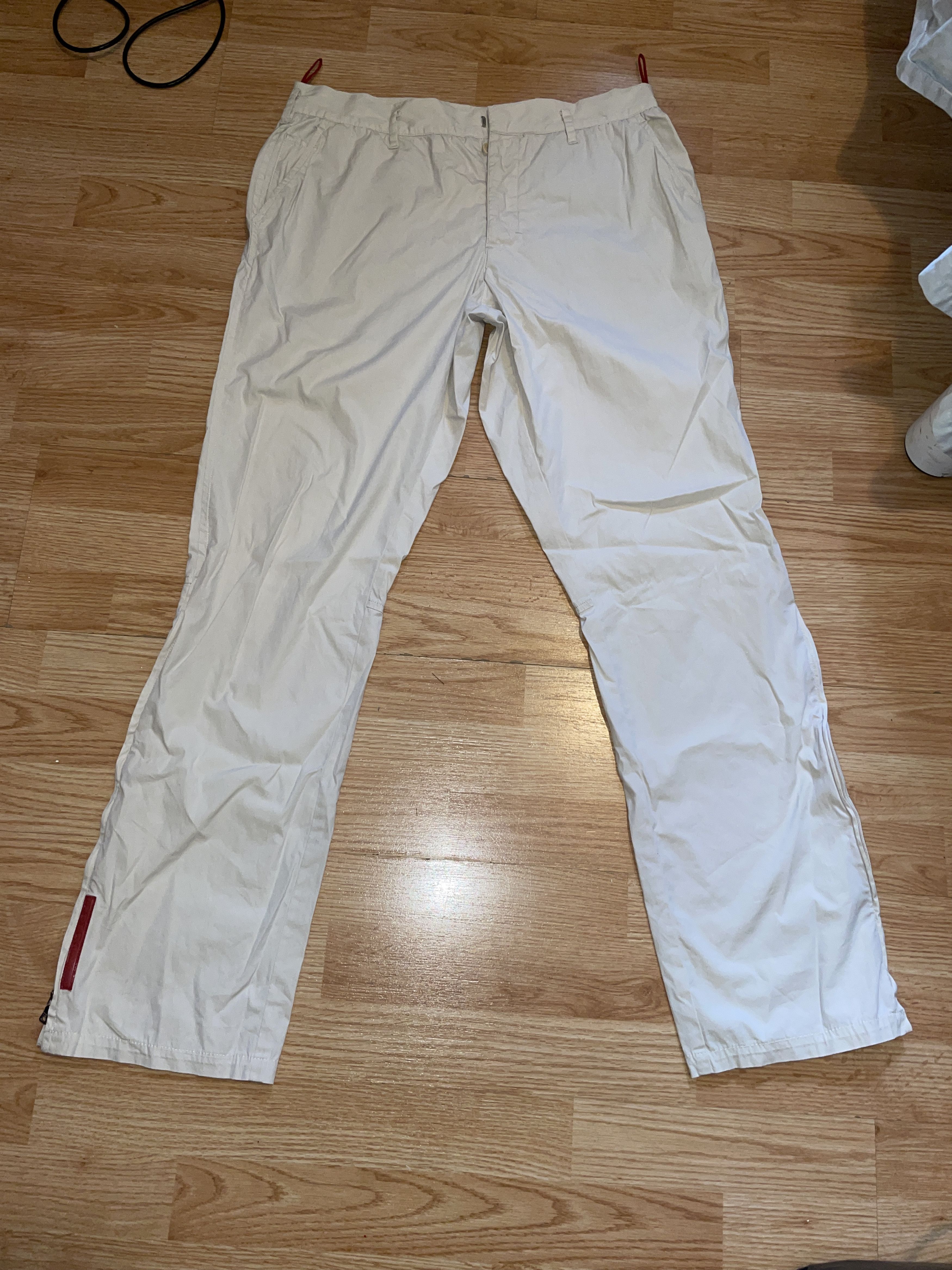 image of Prada Sport Red Stripe Track Pants in Khaki, Men's (Size 32)