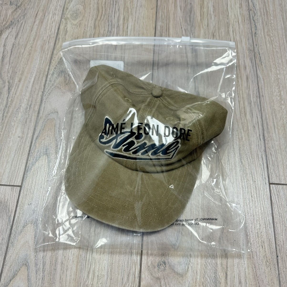Aime Leon Dore Aimé Leon Dore ALD Cycling Logo Tan & Navy Hat DS Size ONE SIZE - 4 Thumbnail