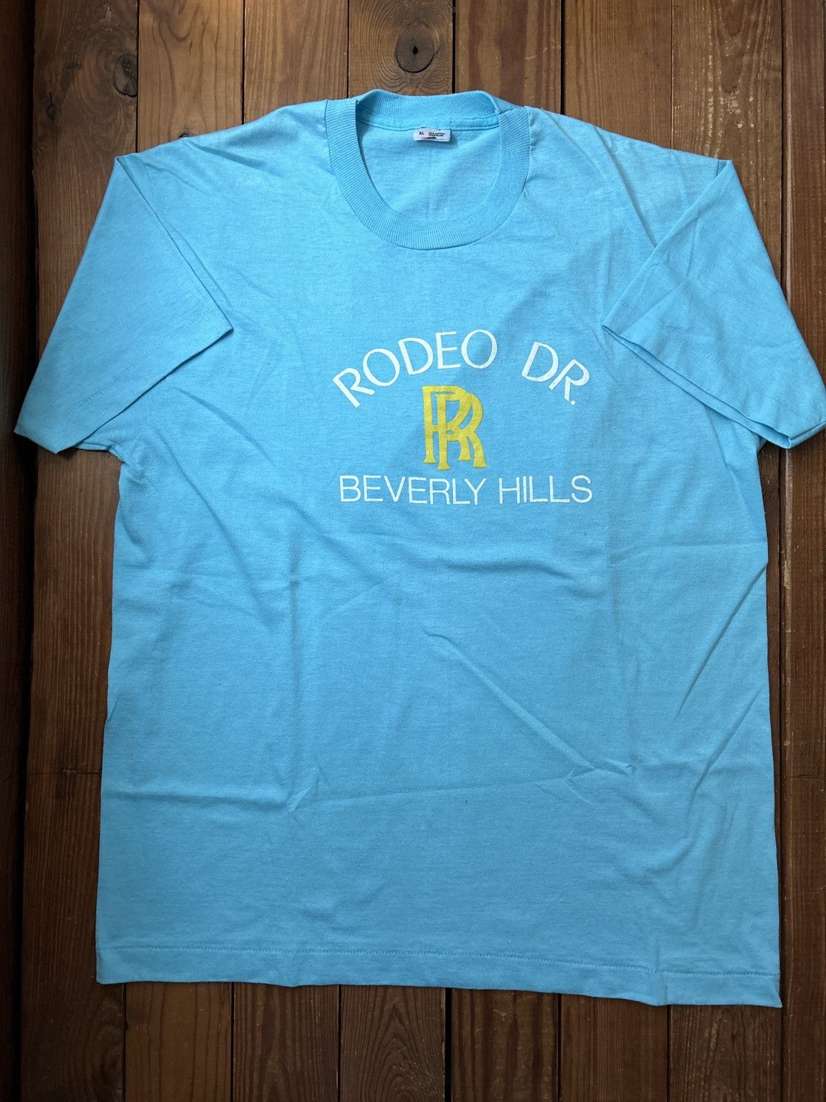 image of Vintage 90's Rolls Royce Rodeo Drive Light Blue Tee Shirt, Men's (Size XL)