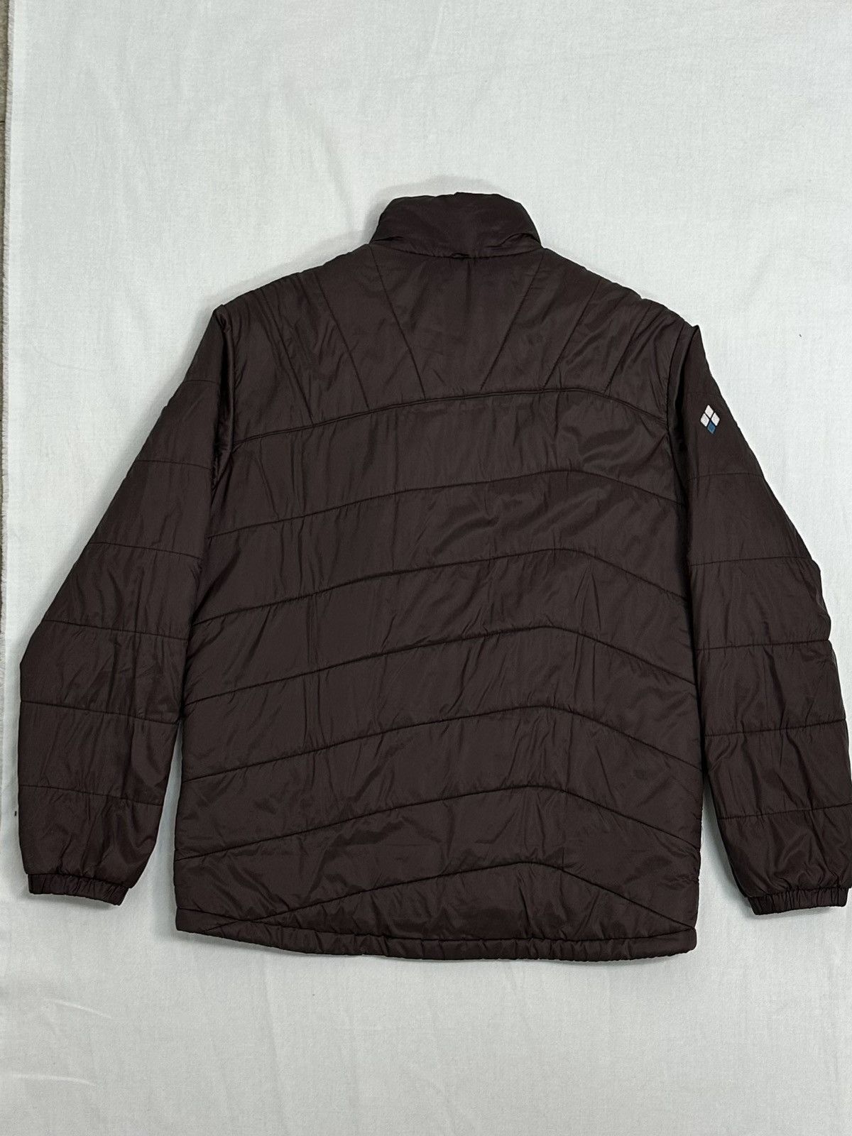 Montbell Montbell 00s wave stitch puffer jacket | Grailed