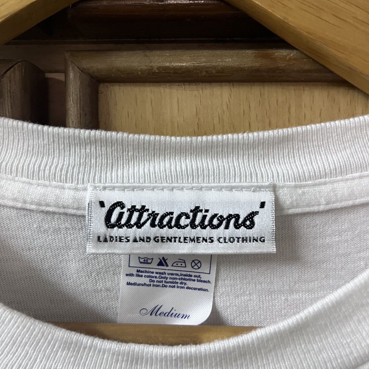 ATTRACTIONS Attractions tee Size US M / EU 48-50 / 2 - 5 Thumbnail