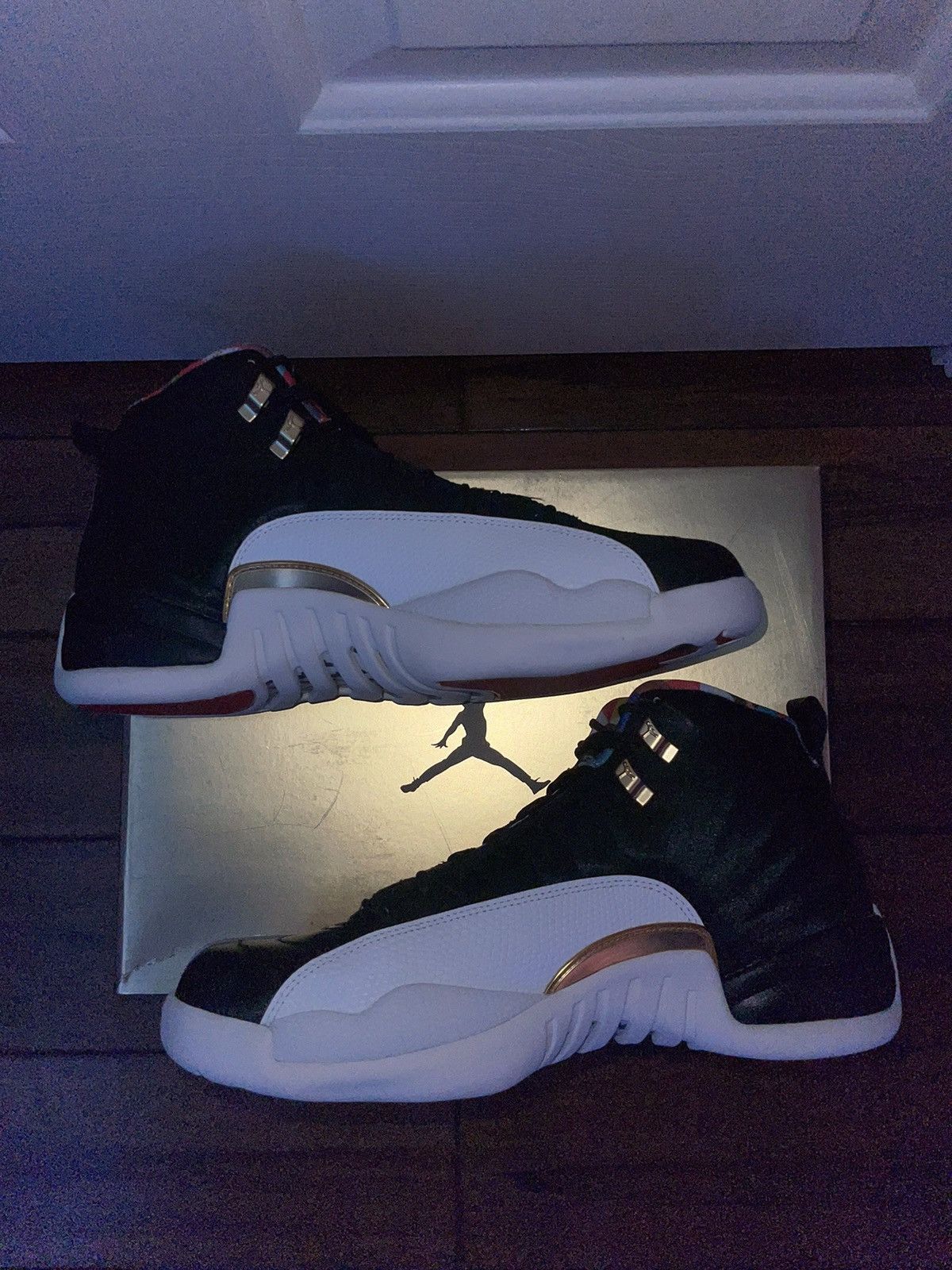 image of Jordan Brand 12 Cny Shoes in Black, Men's (Size 11)
