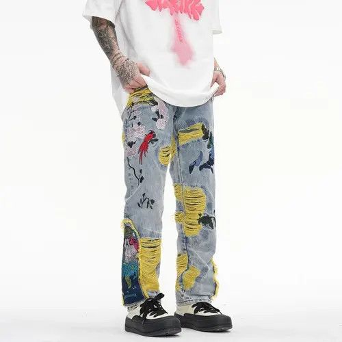 image of Distressed Denim x Jean Embroidered Patch Denim Ripped Jeans in Blue, Men's (Size 35)