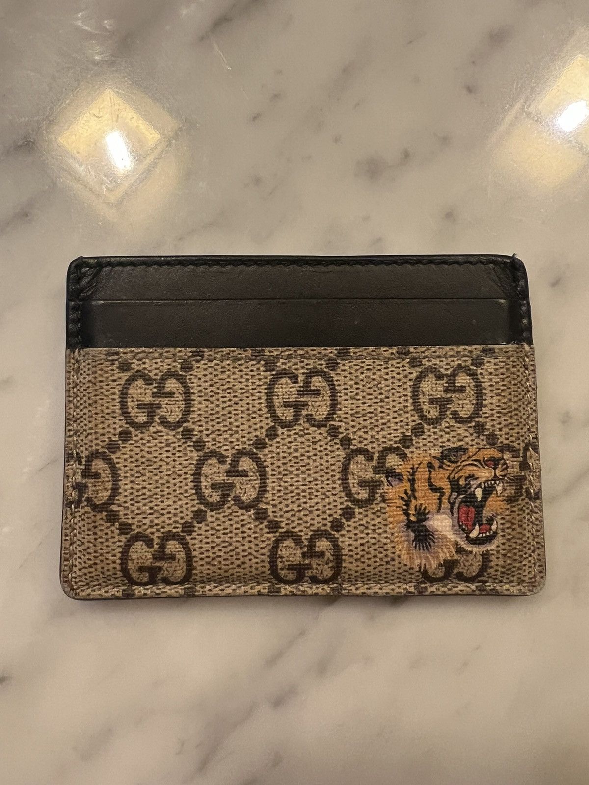 image of Gucci Monogram GG Tiger Print Card Case in Black/Beige, Men's