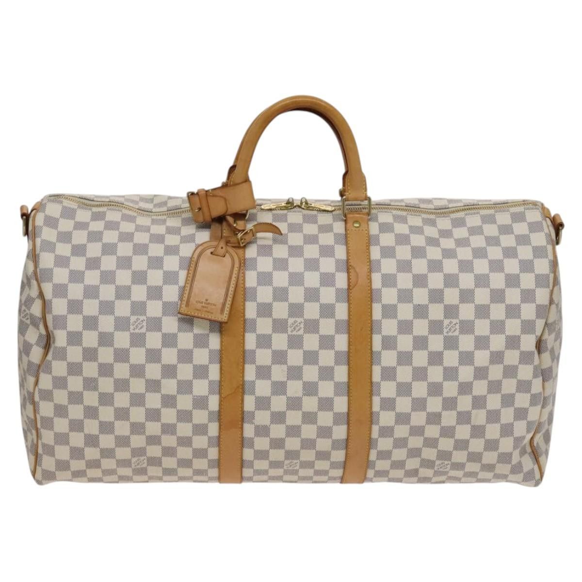 Keepall Bandouliere 55 White Canvas Travel Bag (Pre-Owned)
