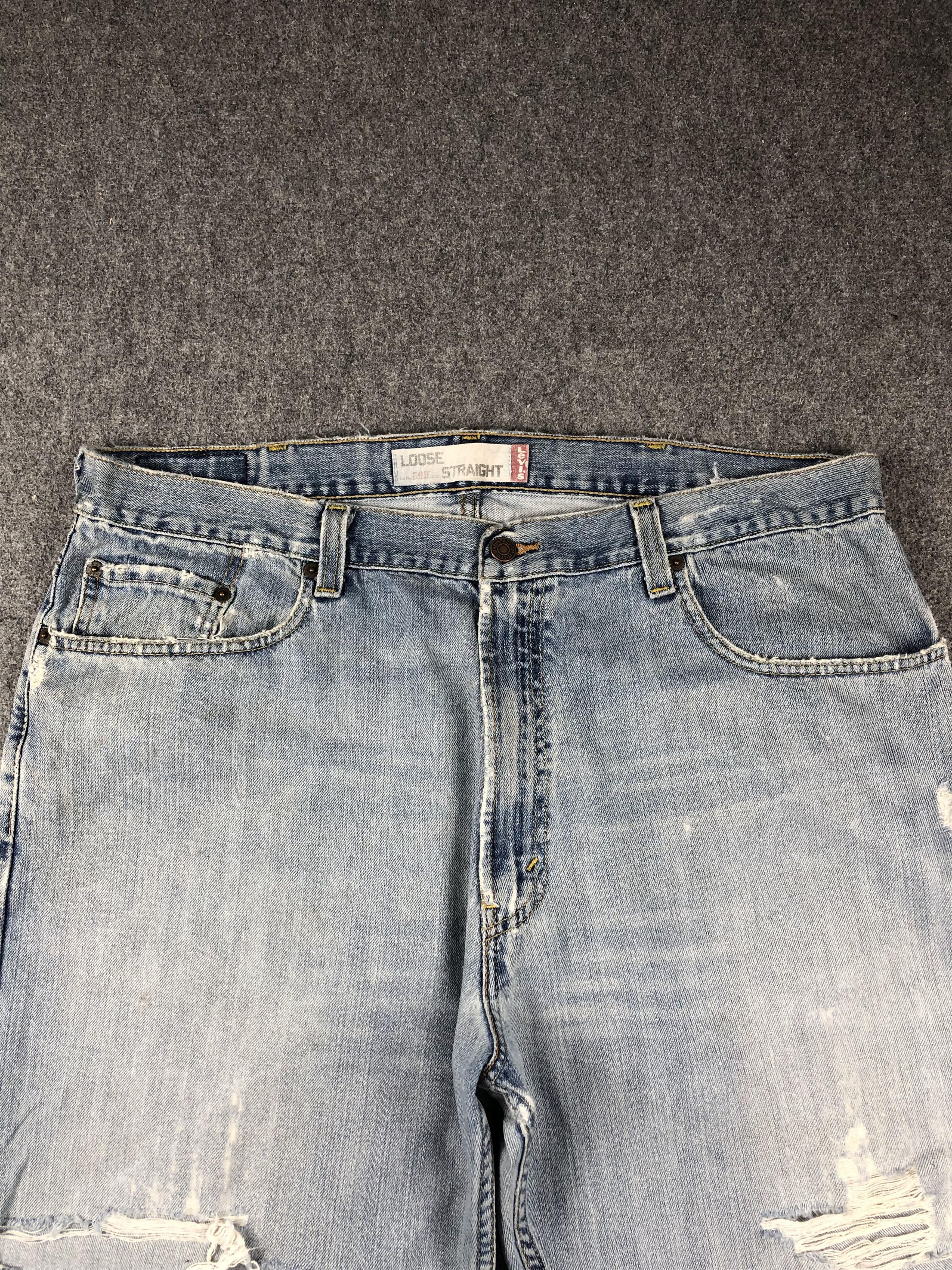 Vintage Disressed Levis 569 Light Wash Jeans DP2270