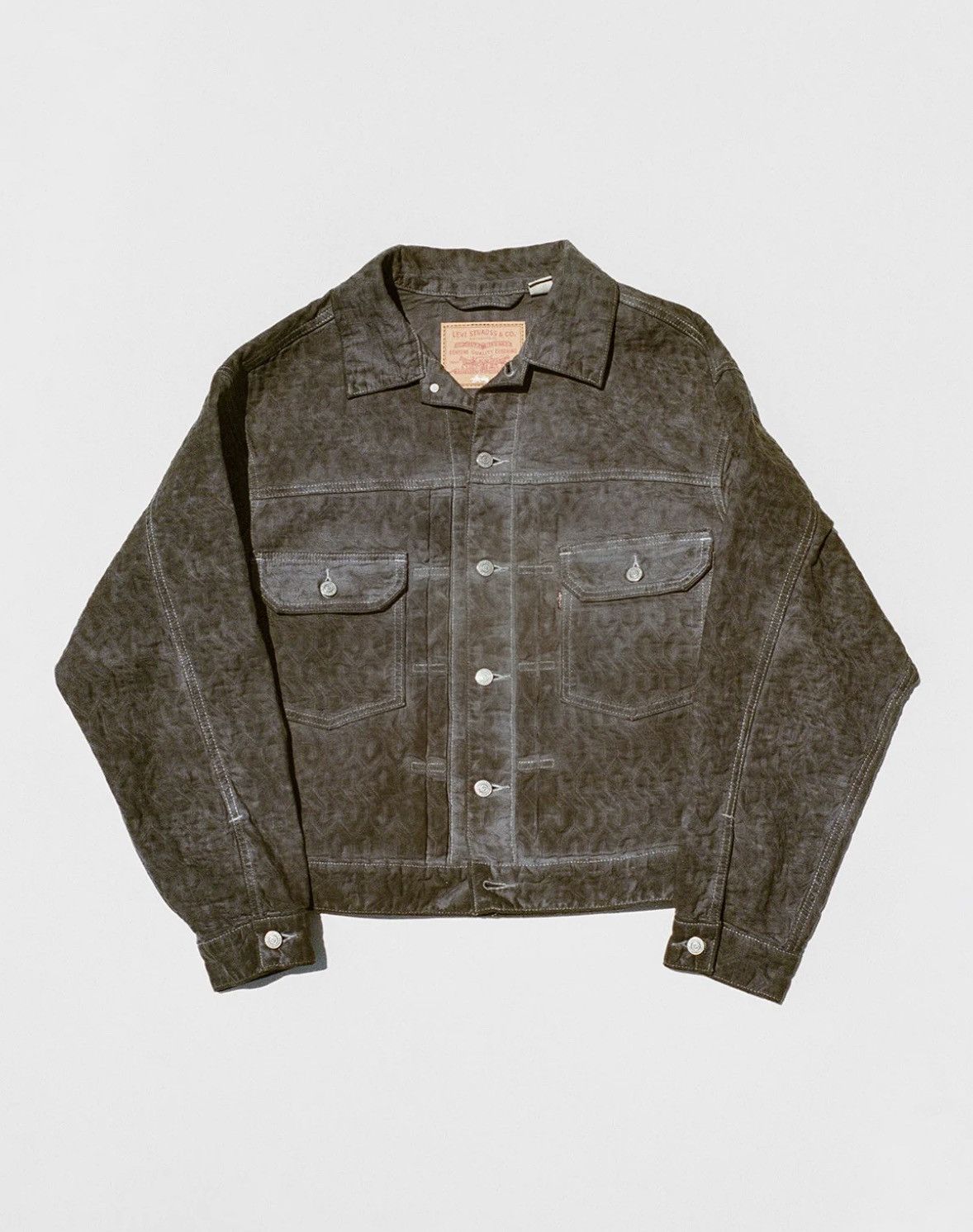 Stussy Stüssy x Levi's Black Dyed Jacquard Trucker Jacket | Grailed