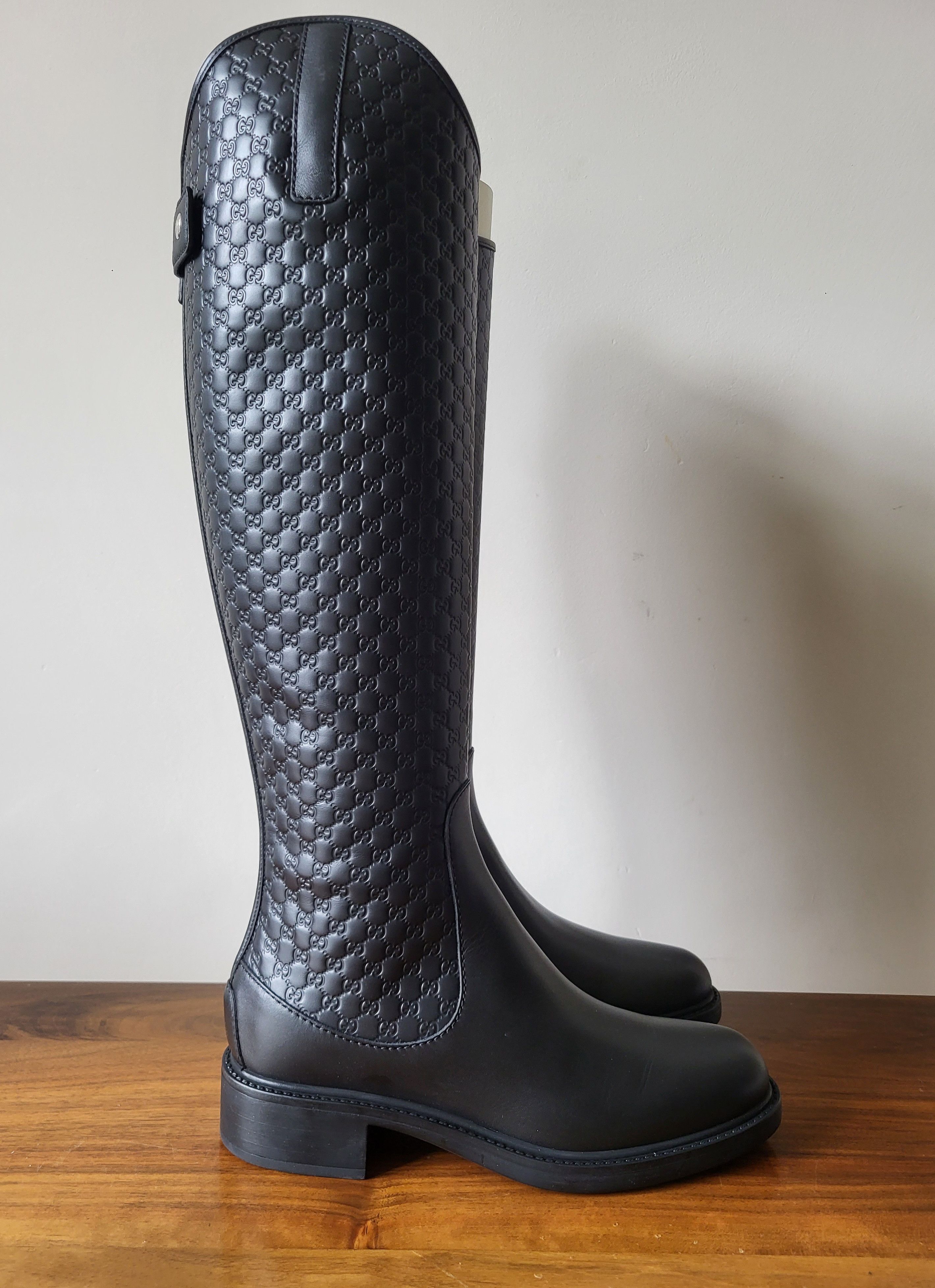 Gucci Authentic Gucci leather riding boots embossed logo | Black Size US 6 / IT 36 - 1 Thumbnail