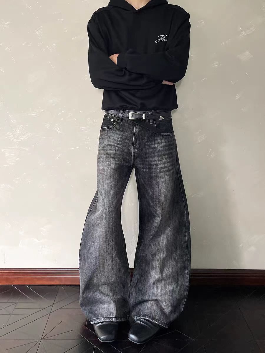 Jean Water-washed black curved-leg distressed jeans Size US 30 / EU 46 - 1 Thumbnail