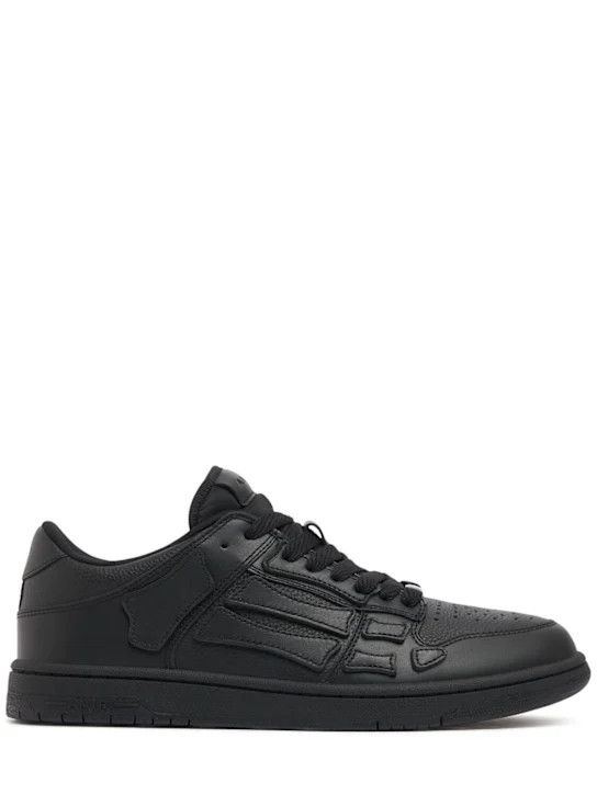 o1lsvrm0425 CNY Skel Top Low Sneakers in Black