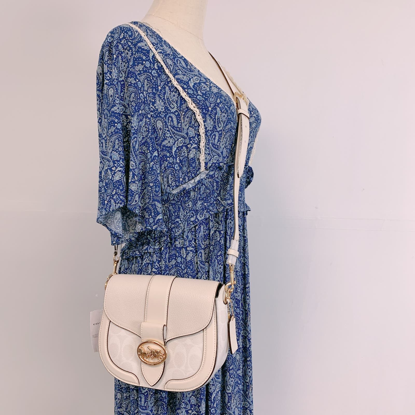 image of Coach C2806 Georgie Saddle Bag In Signature Canvas in White, Women's