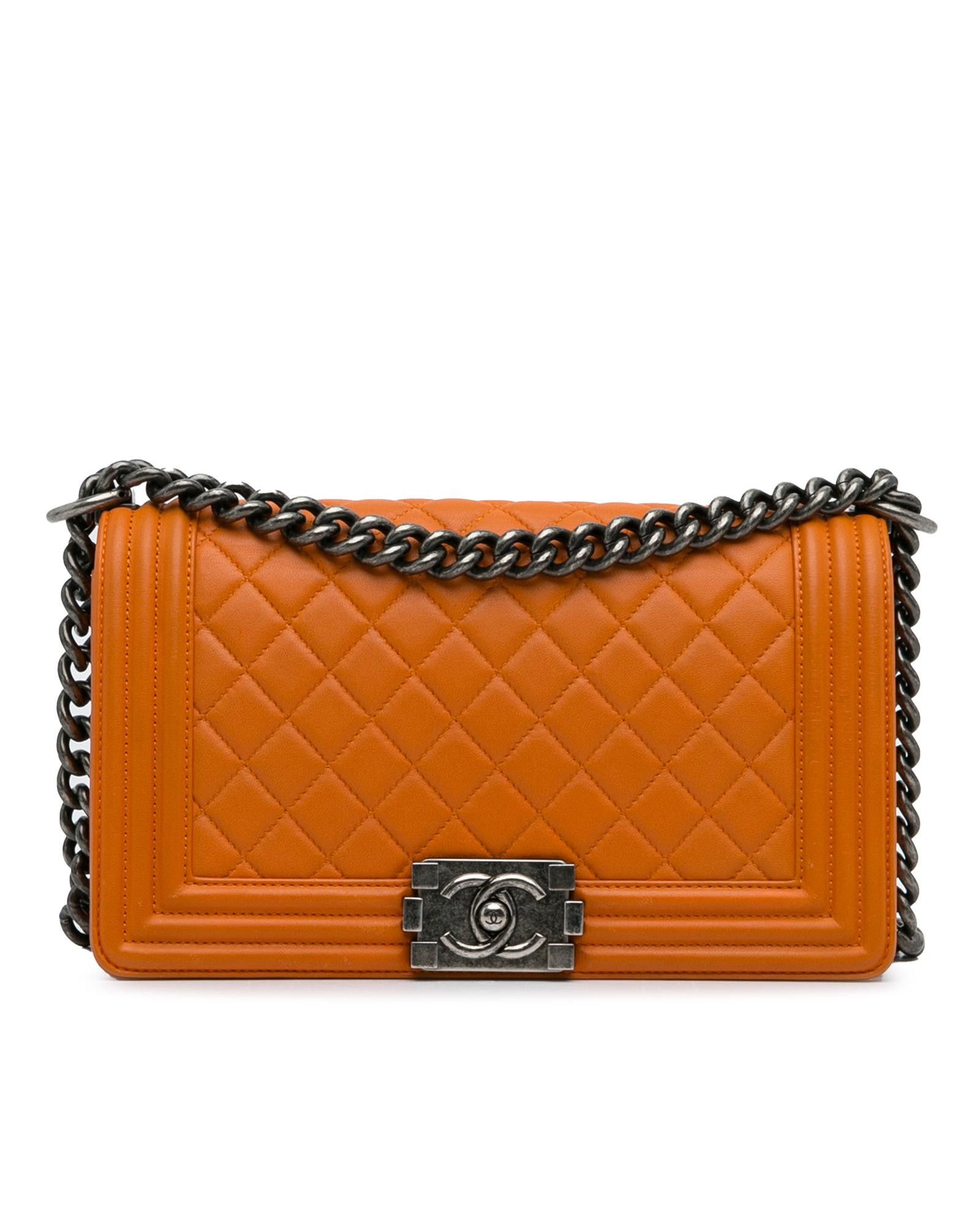 image of Chanel Quilted Lambskin Boy Flap With Curb Chain Strap in Orange, Women's