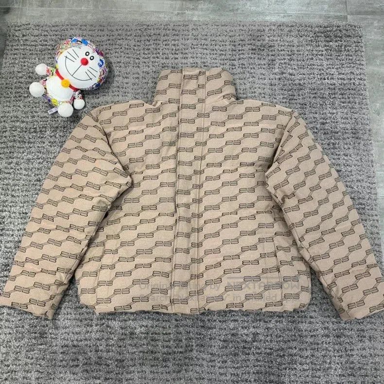 Balenciaga Double B Print Puffer Jacket.