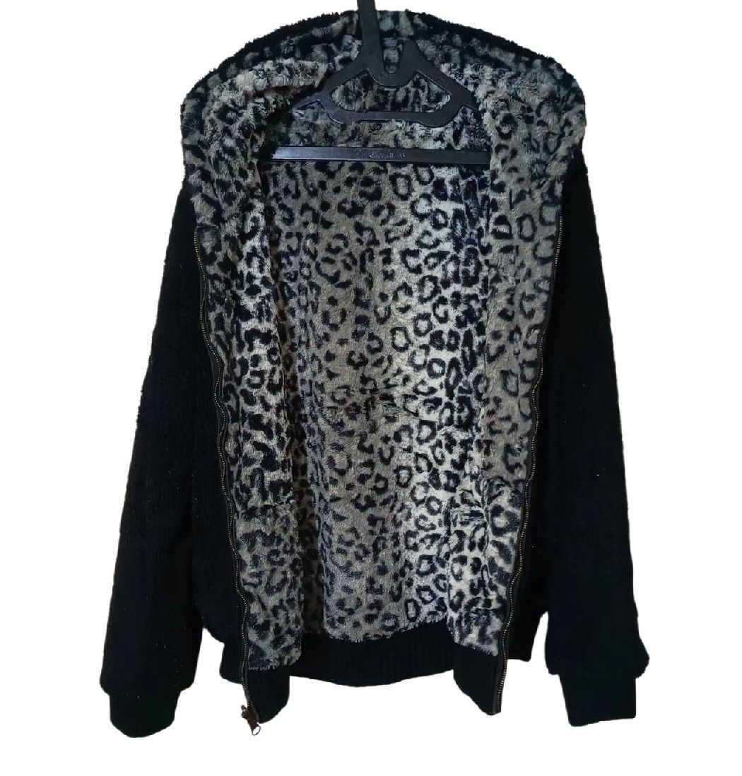 REVERSIBLE JACKET LEOPARD FLEECE BACKPACK