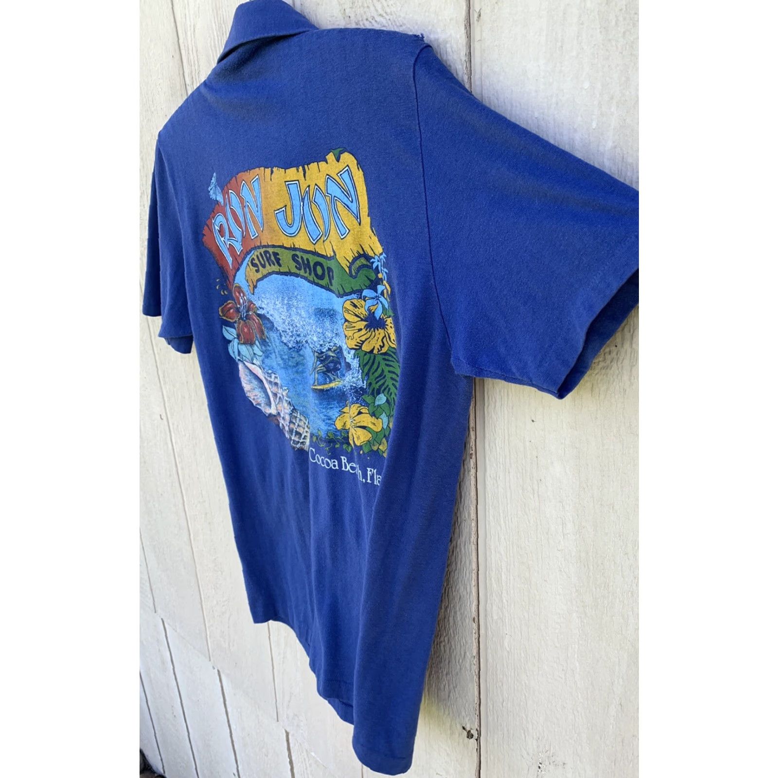 Vintage VINTAGE Ron Jon Surf Shop Cocoa Beach Florida graphic tee polo shirt M Blue Beach Flower Graphic Print T-Shirt Men Mens Size US M / EU 48-50 / 2 - 6 Thumbnail