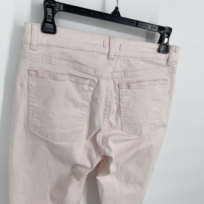 Pastel pink skinny jeans