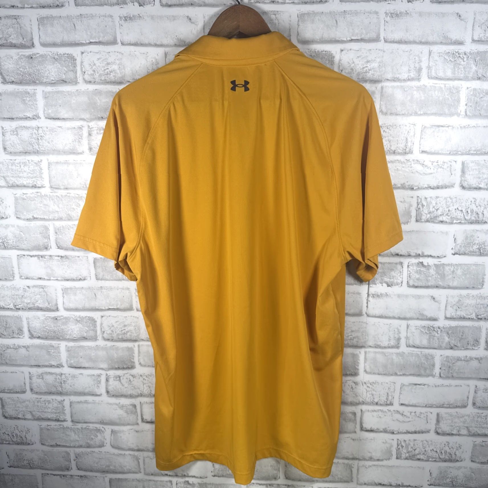 Under Armour VINTAGE? none. We must not include unless vintage. Here: Under Armour HeatGear Yellow Polo Shirt Mens XL Size US XL / EU 56 / 4 - 4 Thumbnail