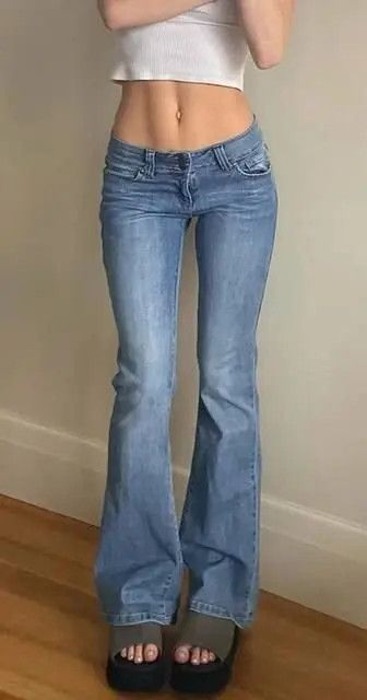 image of Vintage Women's Low-Rise Flared Jeans in Blue (Size 28)
