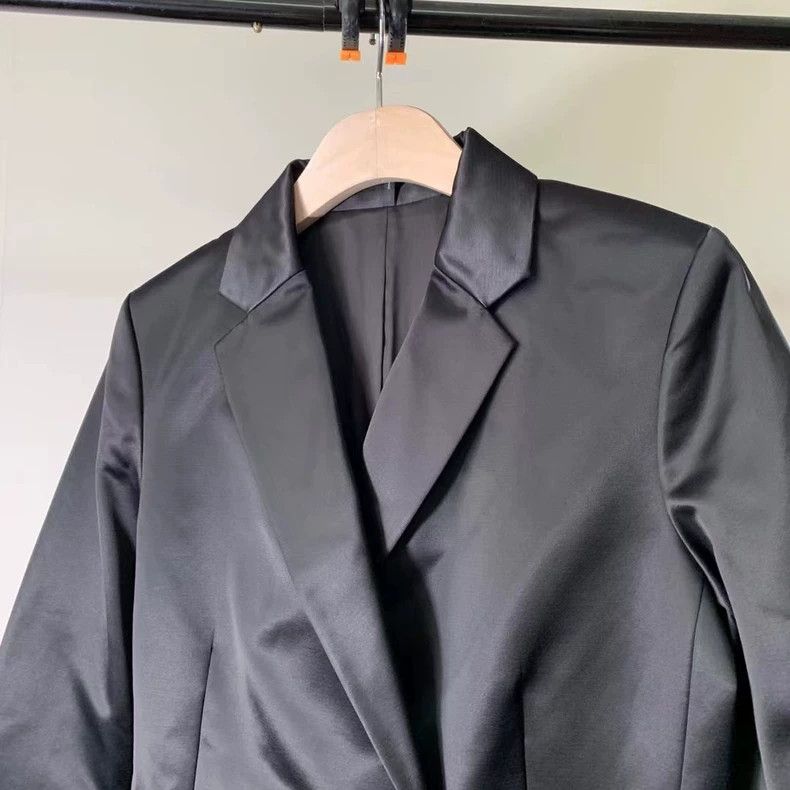 HELMUT LANG A satin waistcoat is an expensive long suit