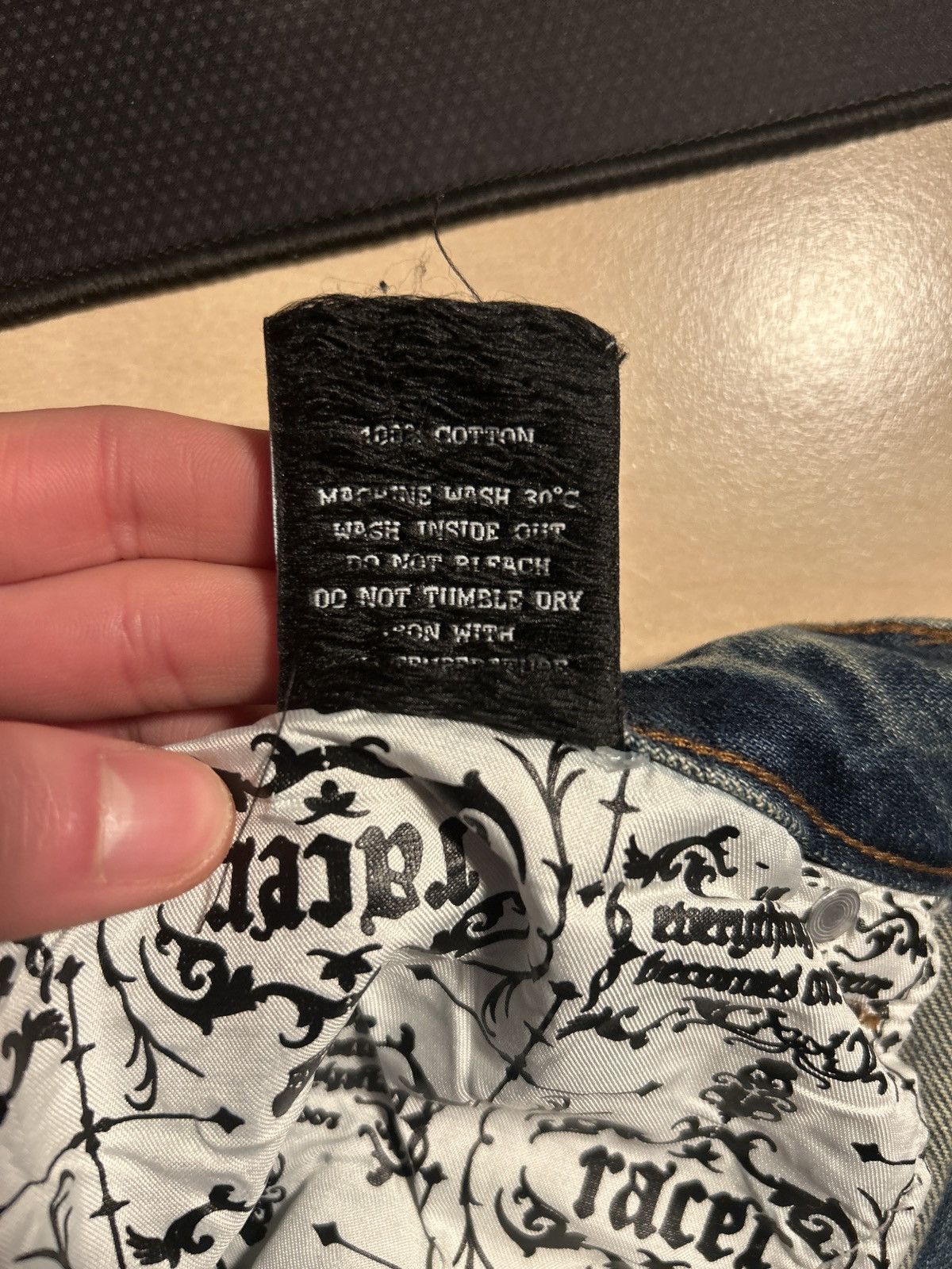 Racer worldwide distressed jeans