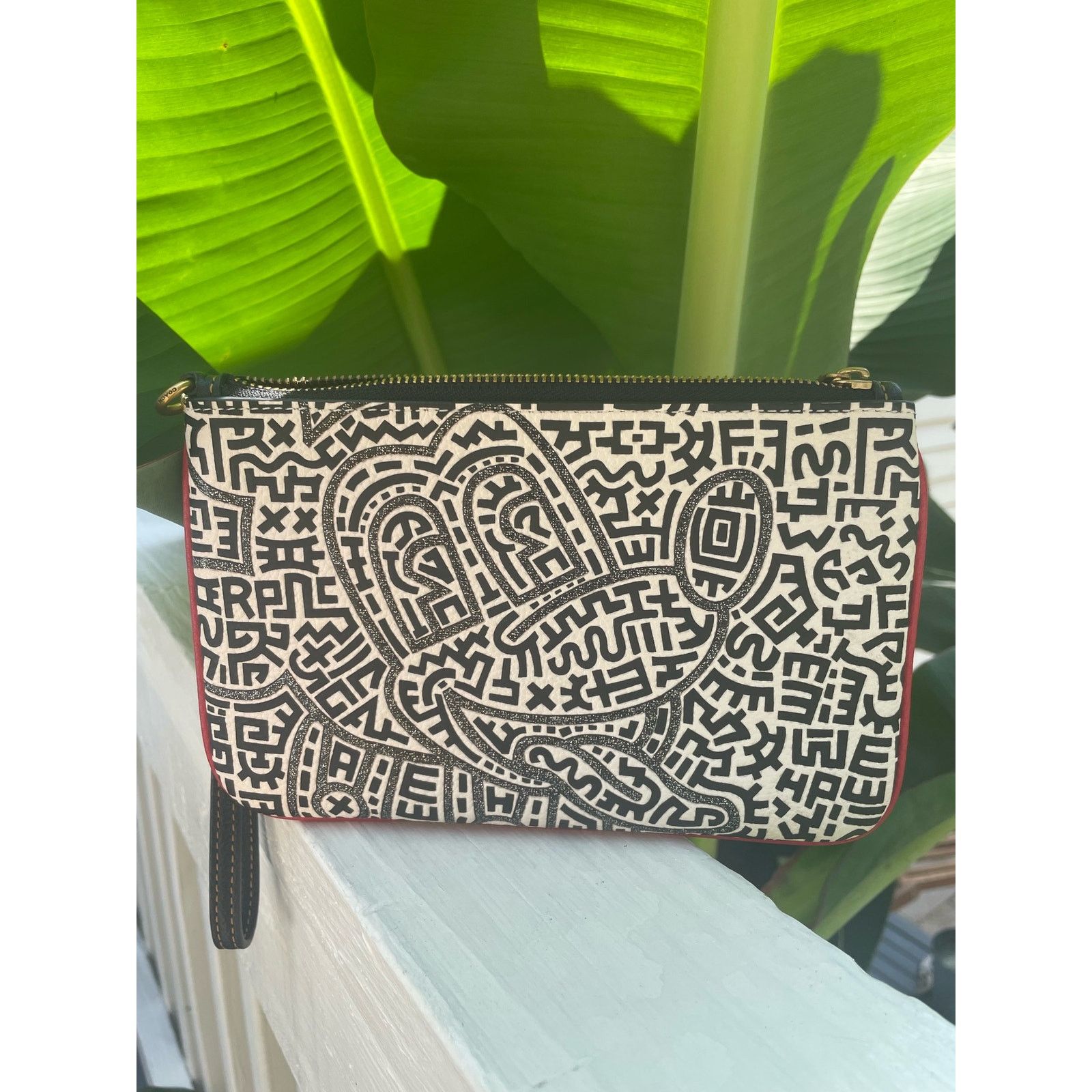 image of Mickey Mouse Keith Haring Coach Wristlet in Black, Women's