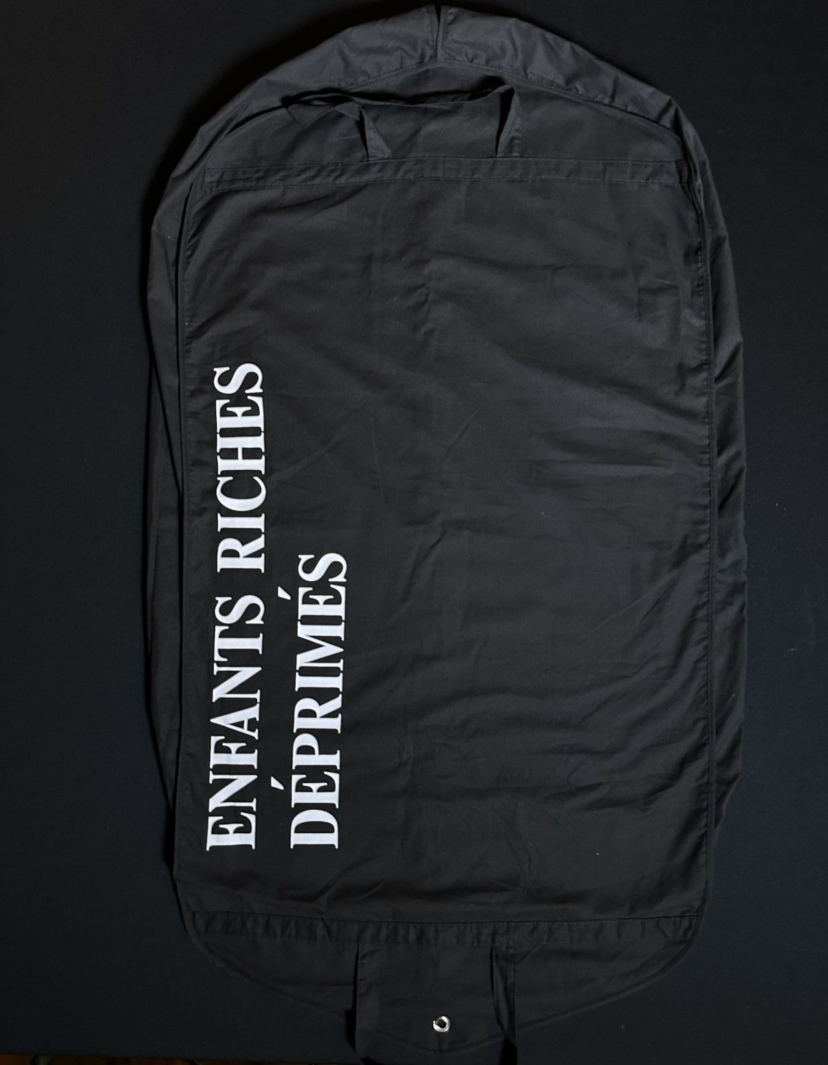 Enfants riches deprimes garment bag
