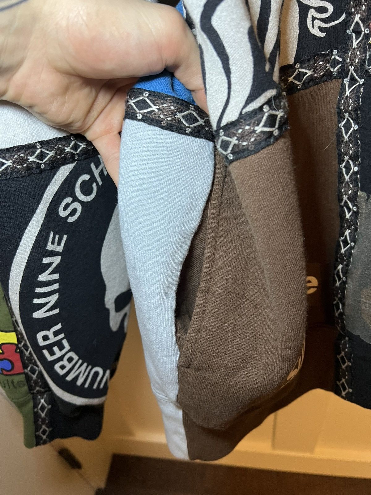 Number (N)ine × Supreme Supreme X Number (N)ine patchwork zip-up hoodie Size US XL / EU 56 / 4 - 23 Thumbnail