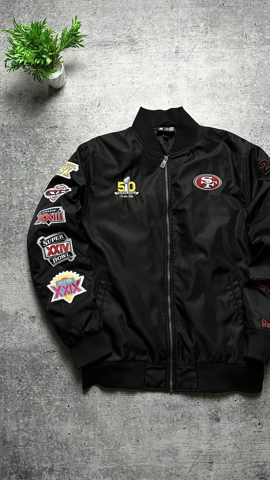 Kith for the NFL: Jaguars Satin Bomber Jacket - Black